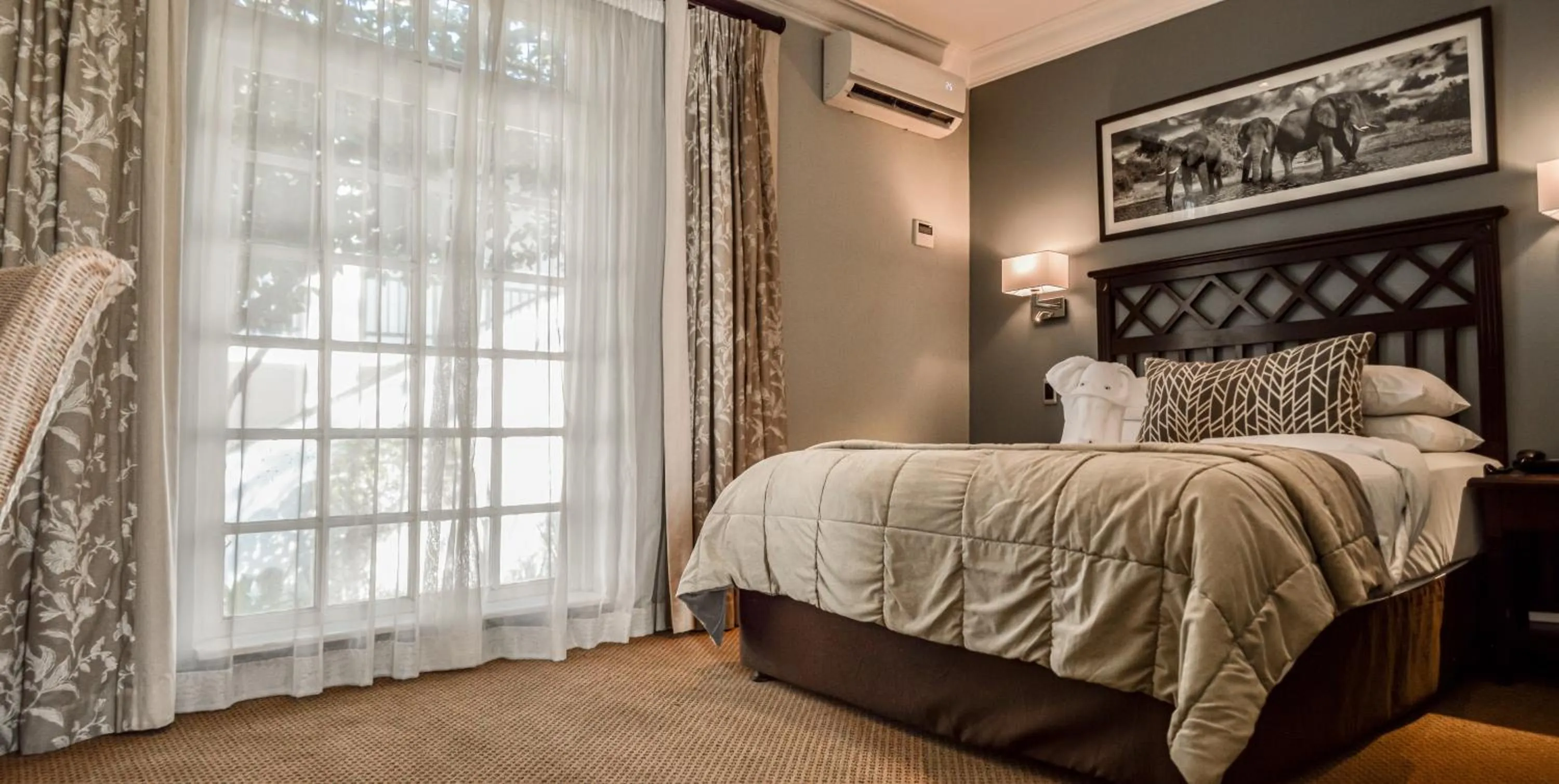 Bed in Indaba Hotel, Spa & Conference Center