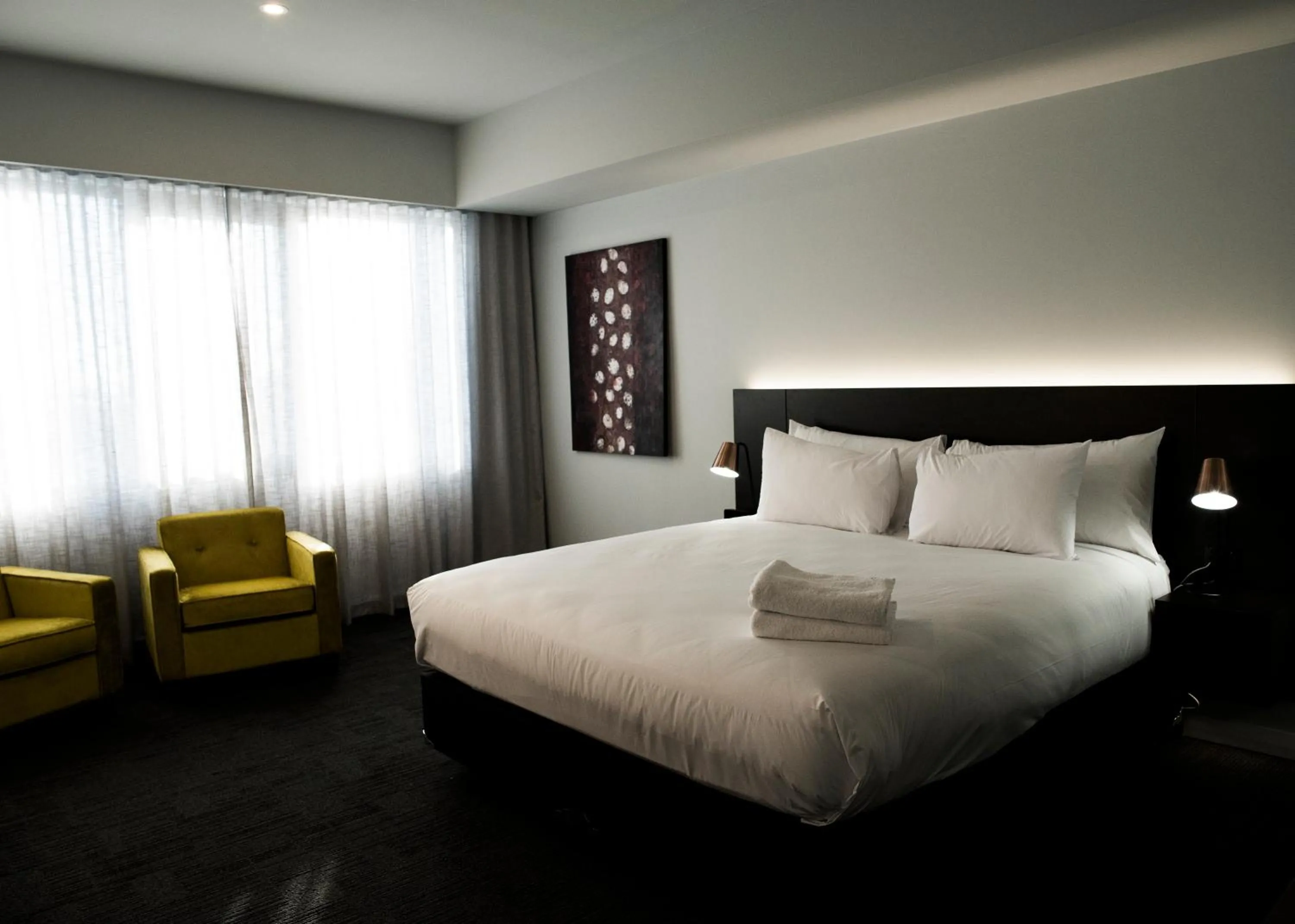 Bed in The Gerald Apartment Hotel