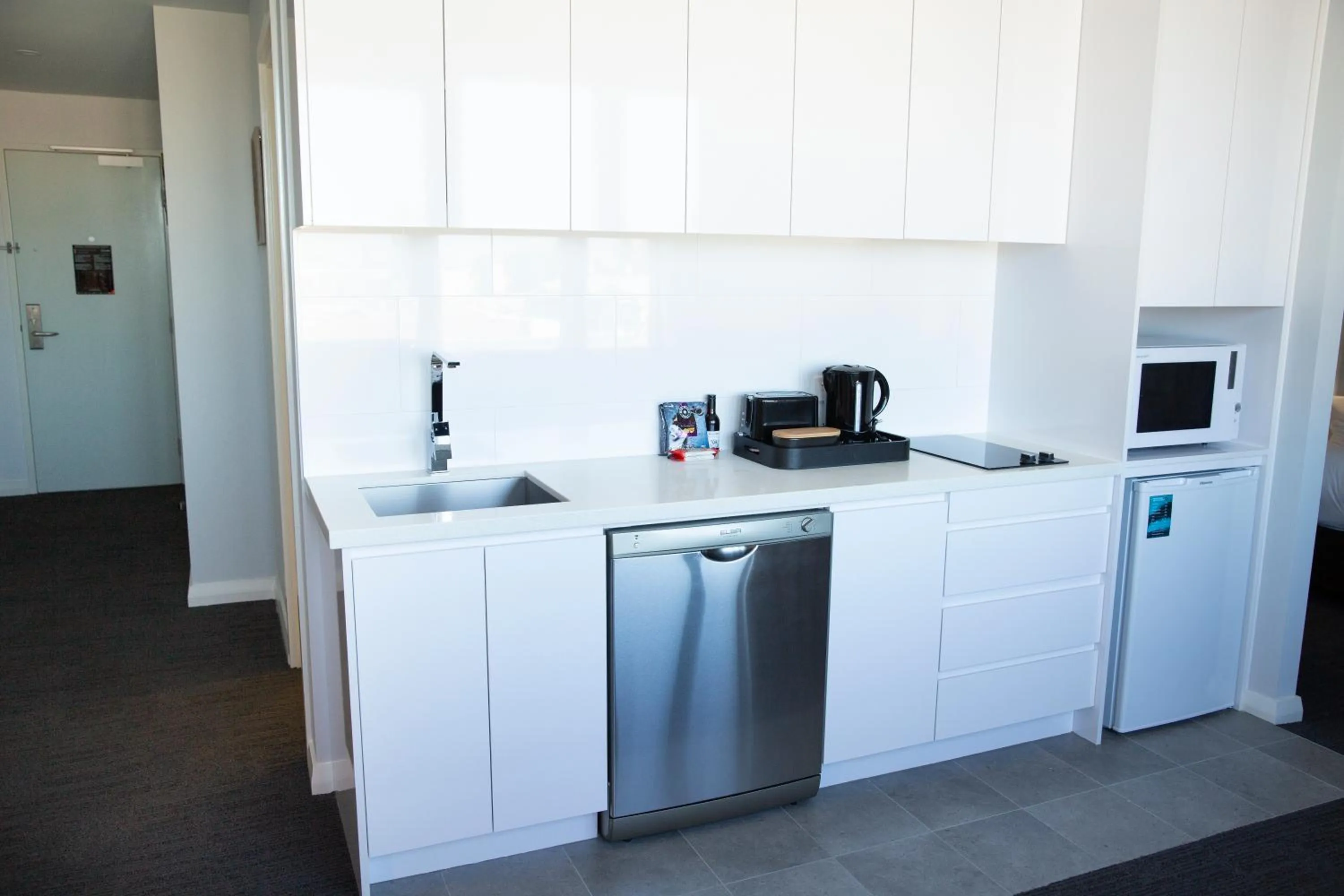 Kitchen or kitchenette in The Gerald Apartment Hotel