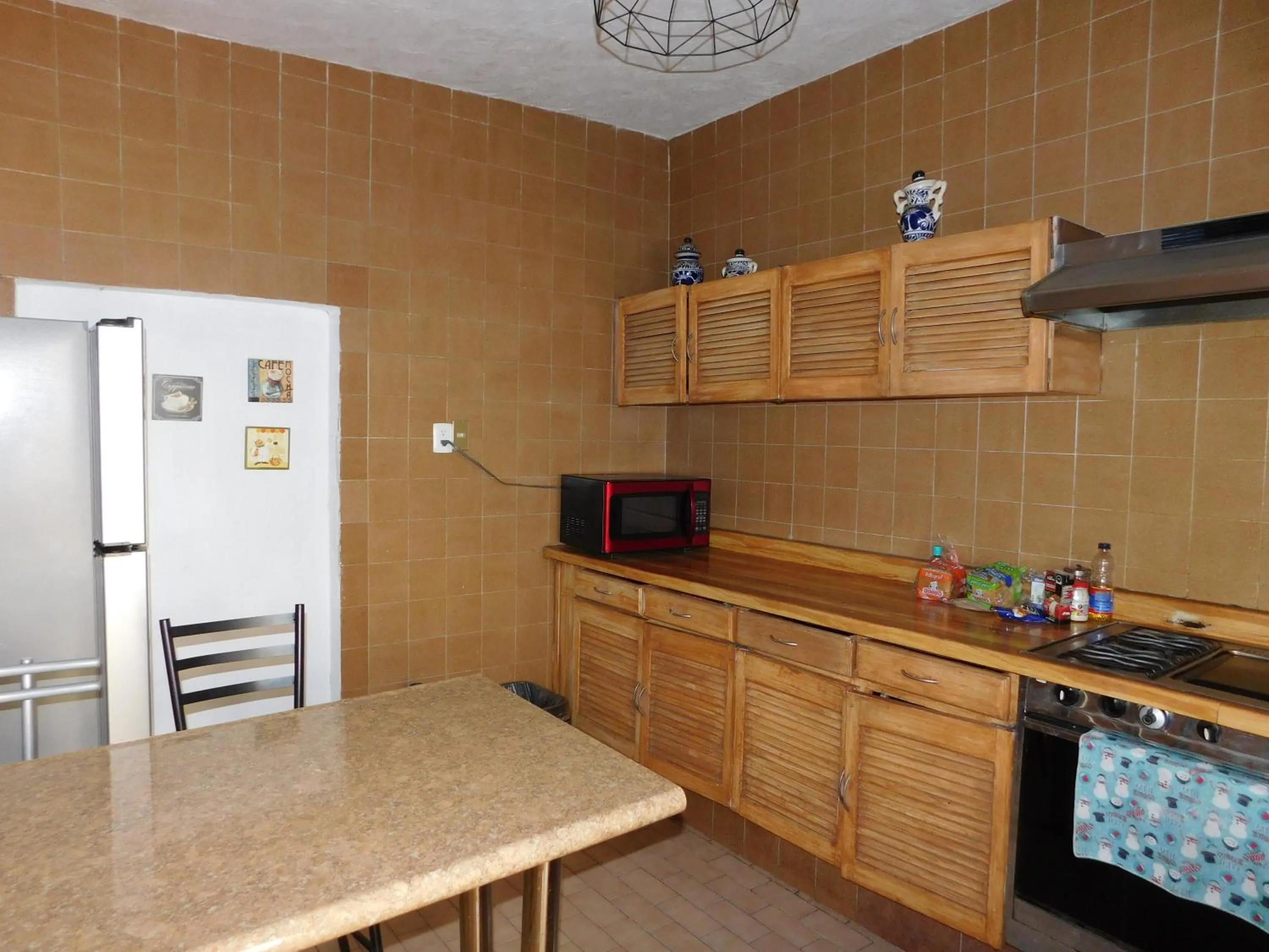 Kitchen or kitchenette in Casona Luciérnaga-Casa de Huéspedes para Grupos