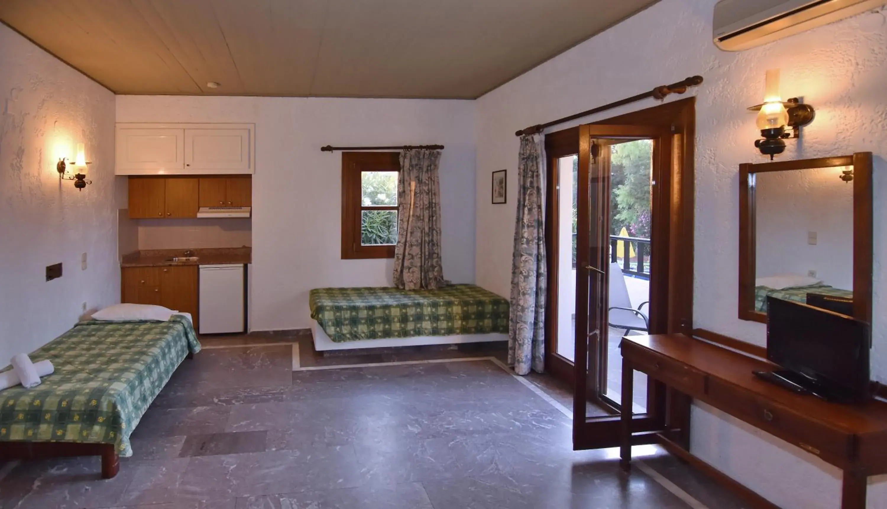 Economy Double Room (3 Adults + 1 Child) in Lyda Hotel Economy Double Room (3 Adults + 1 Child) in Lyda Hotel