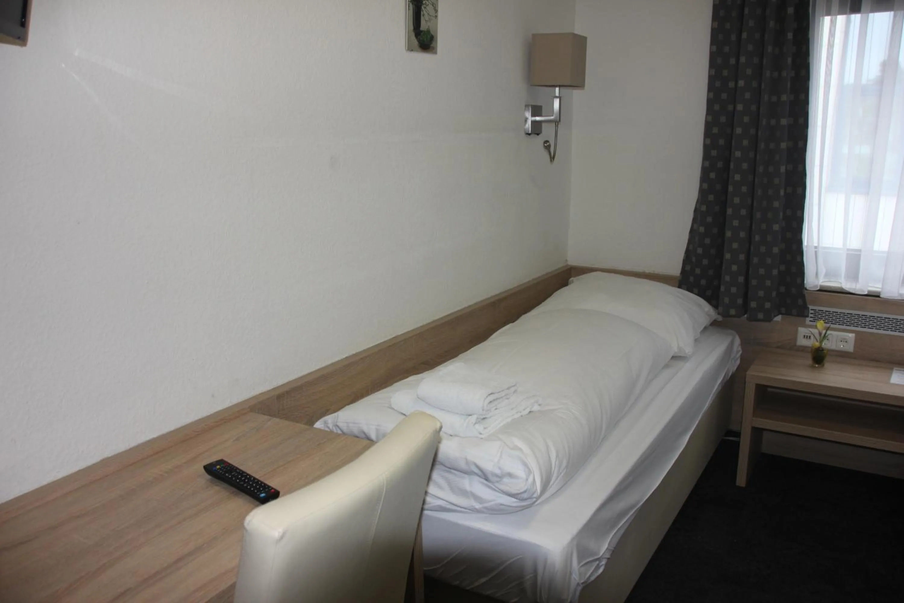 Bed in Airport-Hotel zum Taubengrund