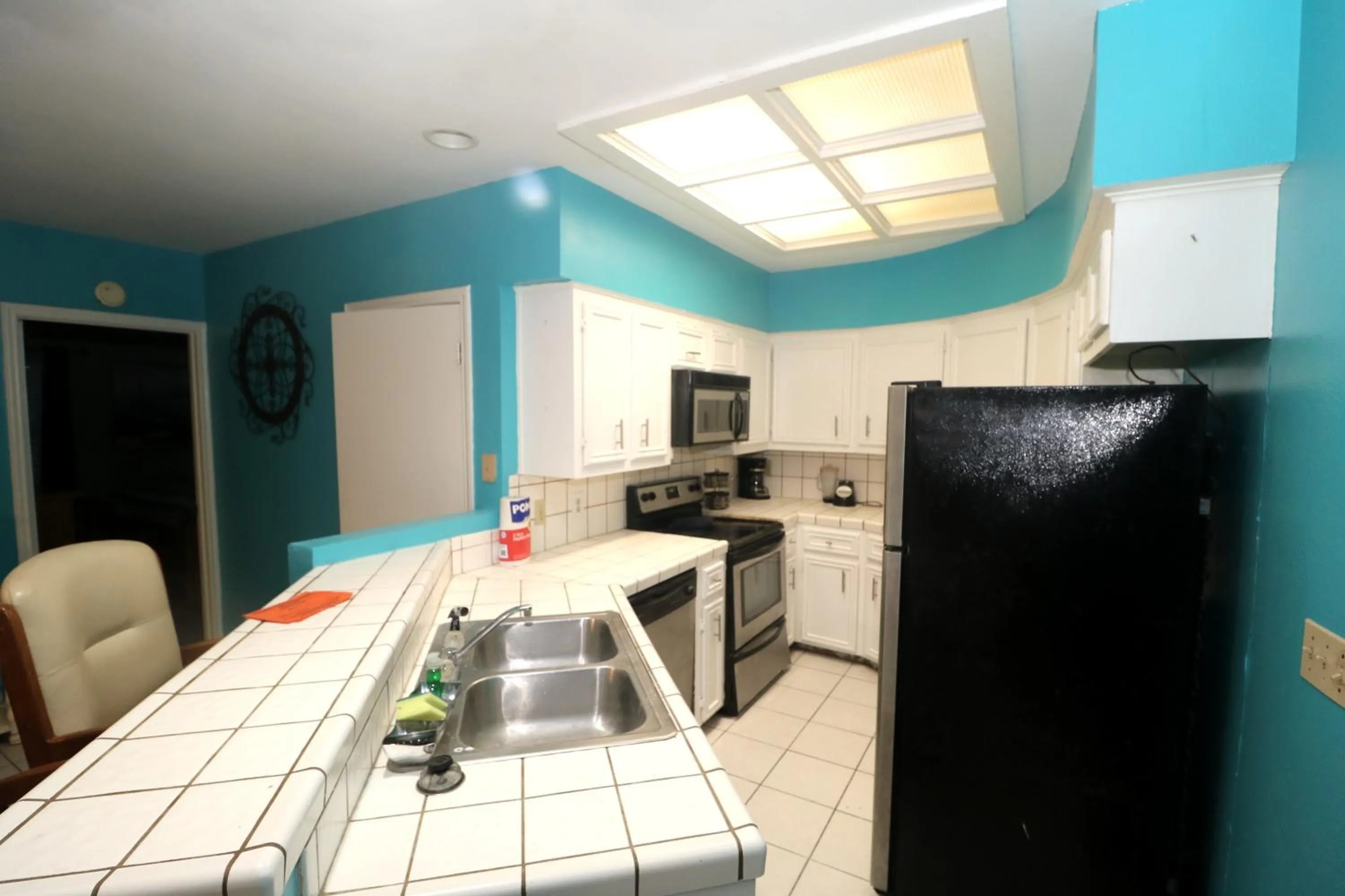 kitchen in The Dunes Condominiums by Cheap Getaway