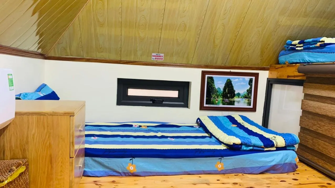 Bed in Hoang Giang Homestay