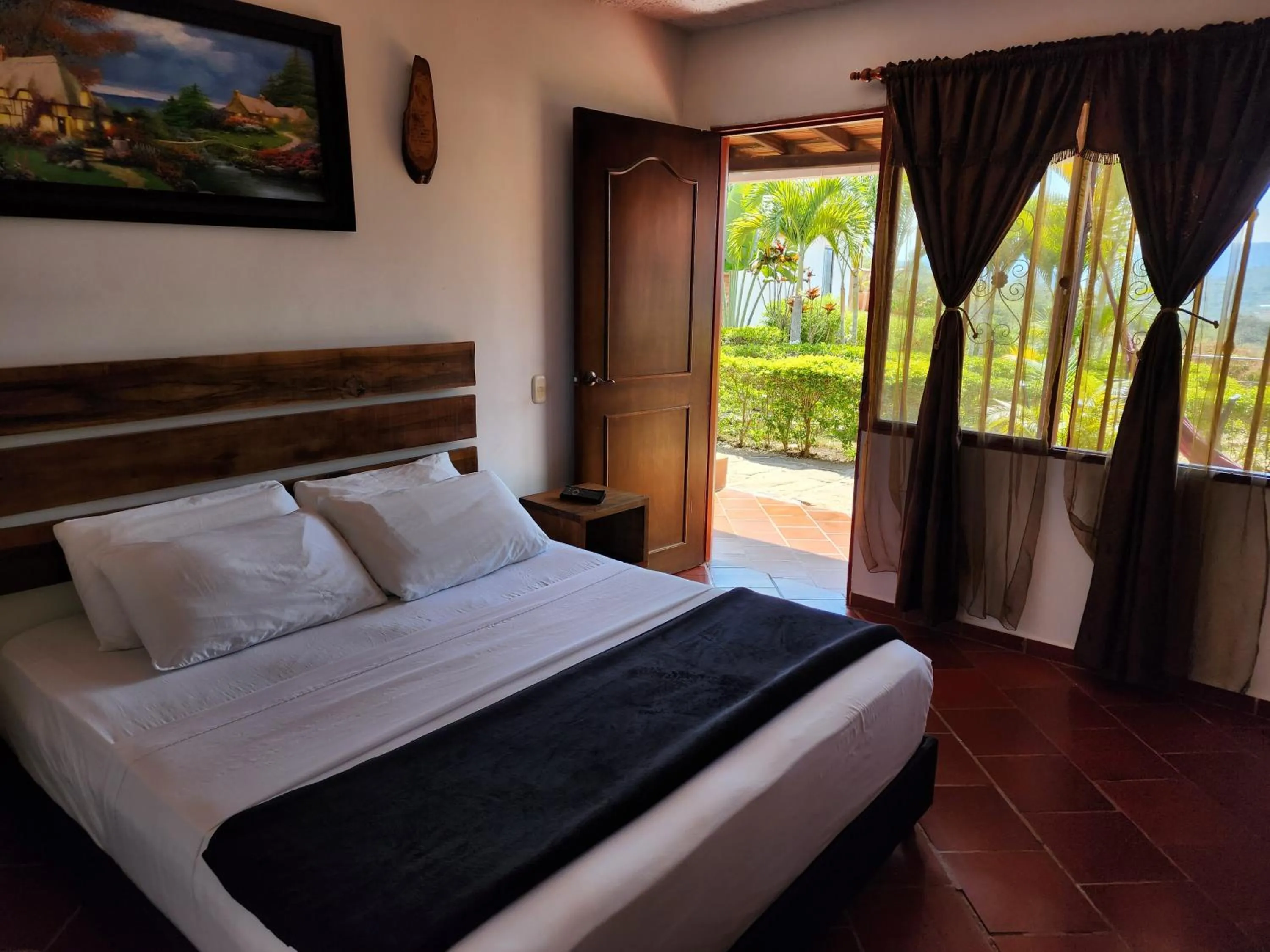 Photo of the whole room, Bed in Hotel Campestre Palmas del Zamorano