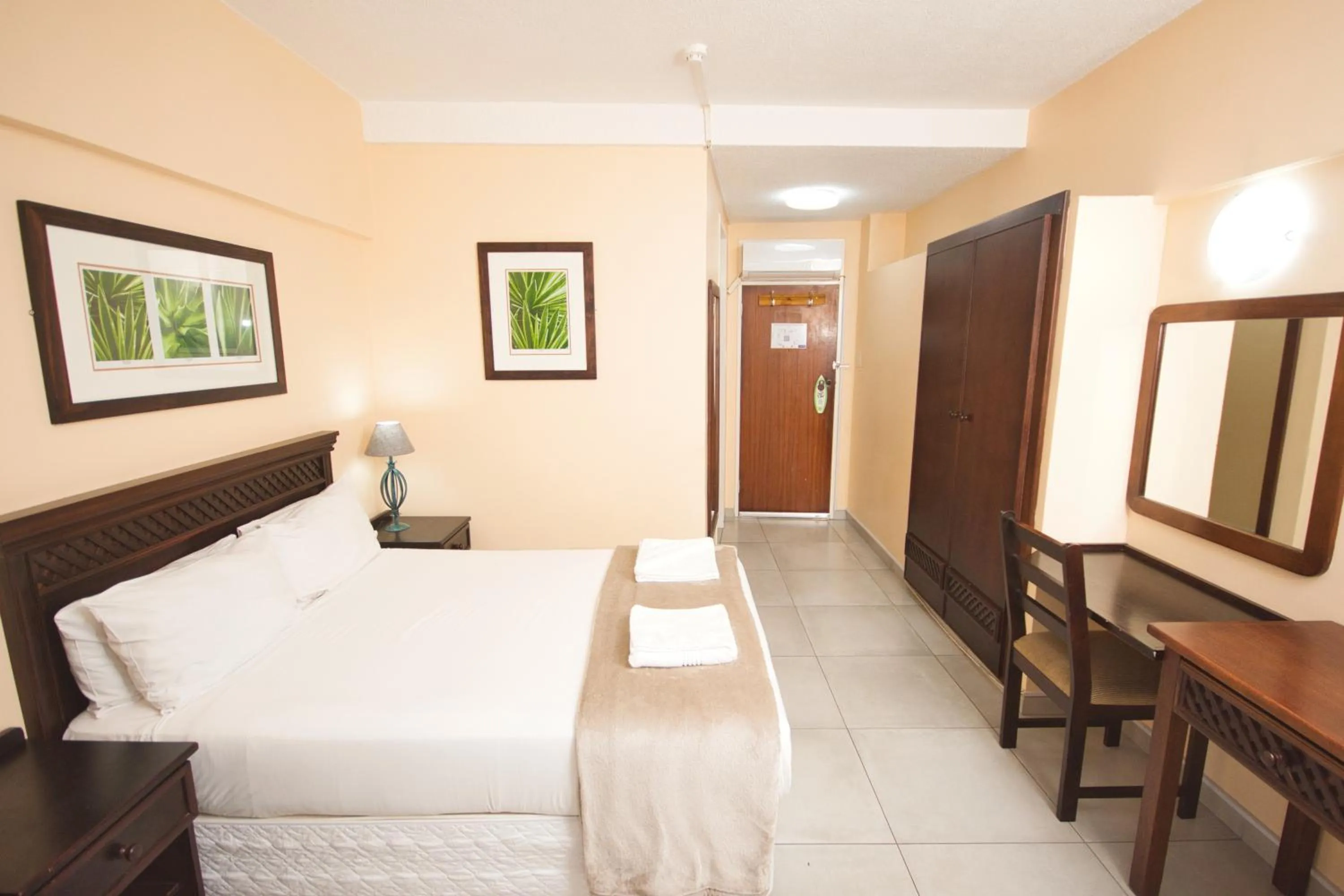 Bed in Gooderson Tropicana Hotel