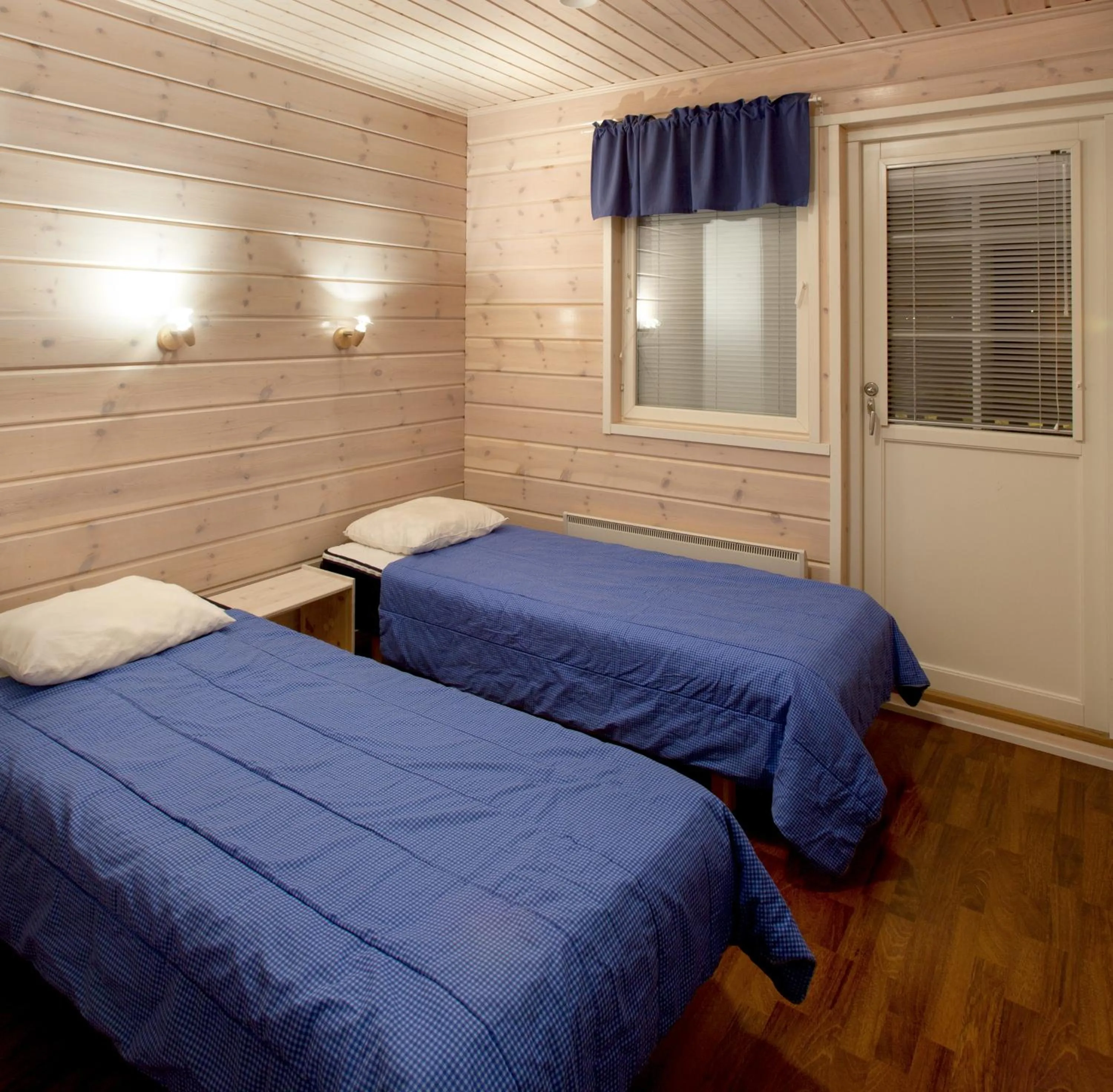 Bed in Himosport Apartments