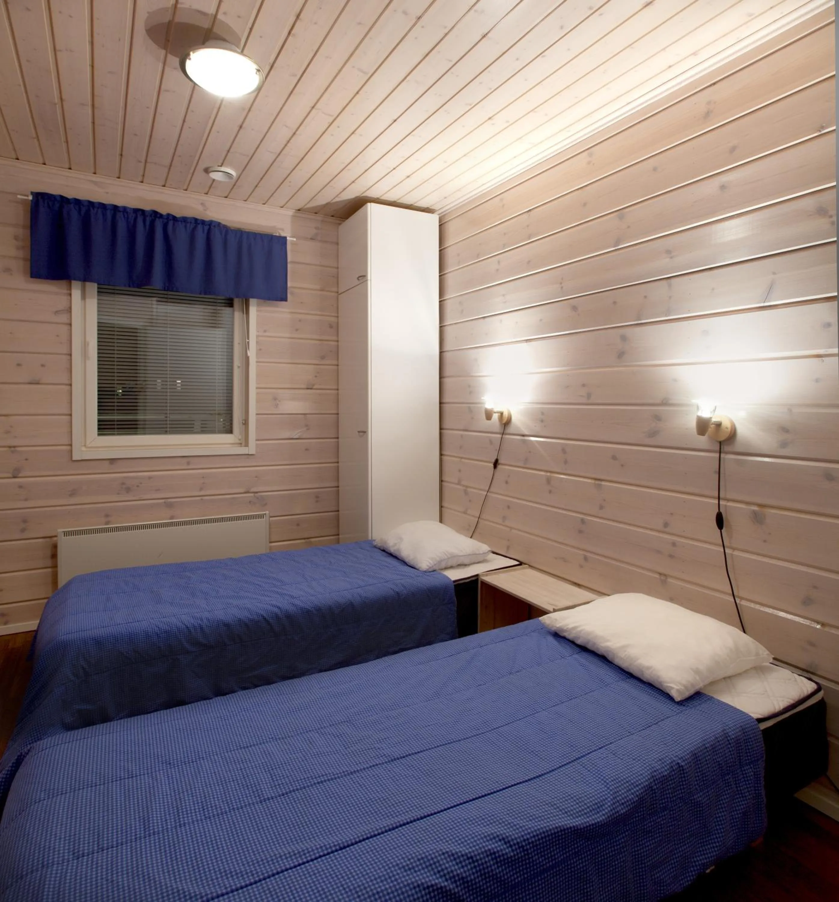 Bed in Himosport Apartments
