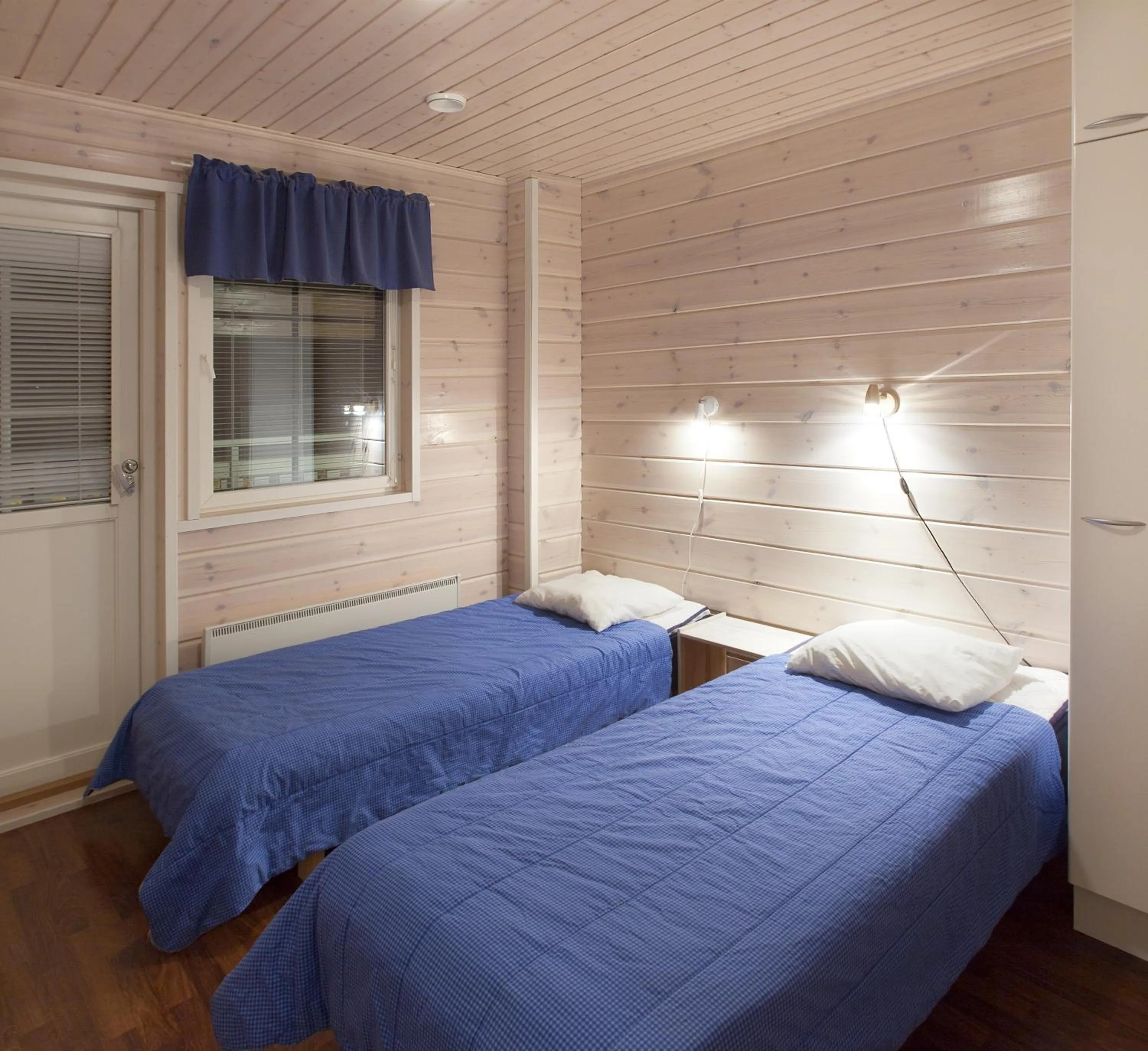 Bed in Himosport Apartments