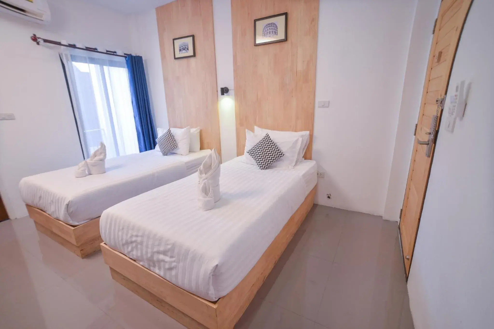 Bed in The Cozy Hotel Bed in The Cozy Hotel