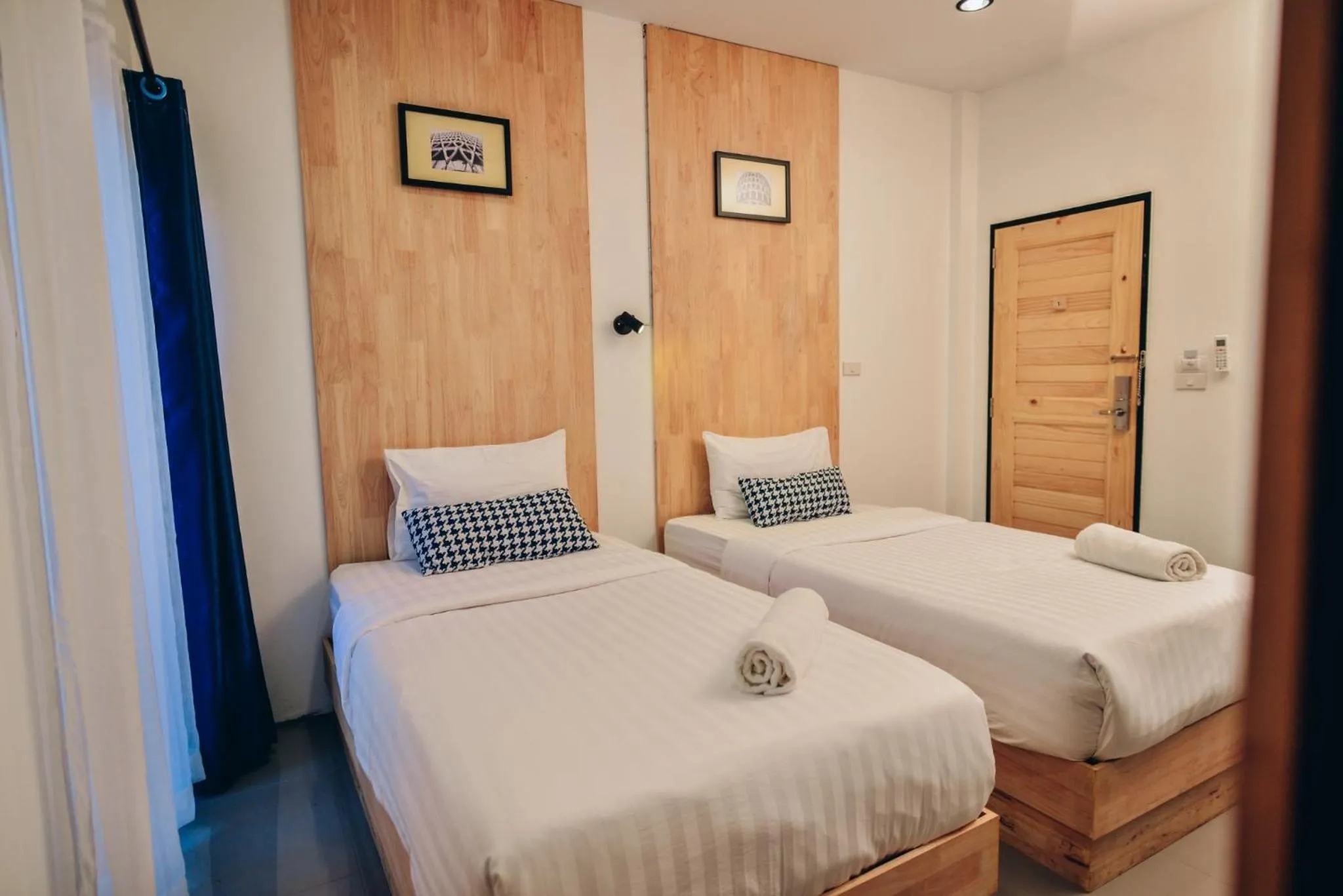 Bed in The Cozy Hotel