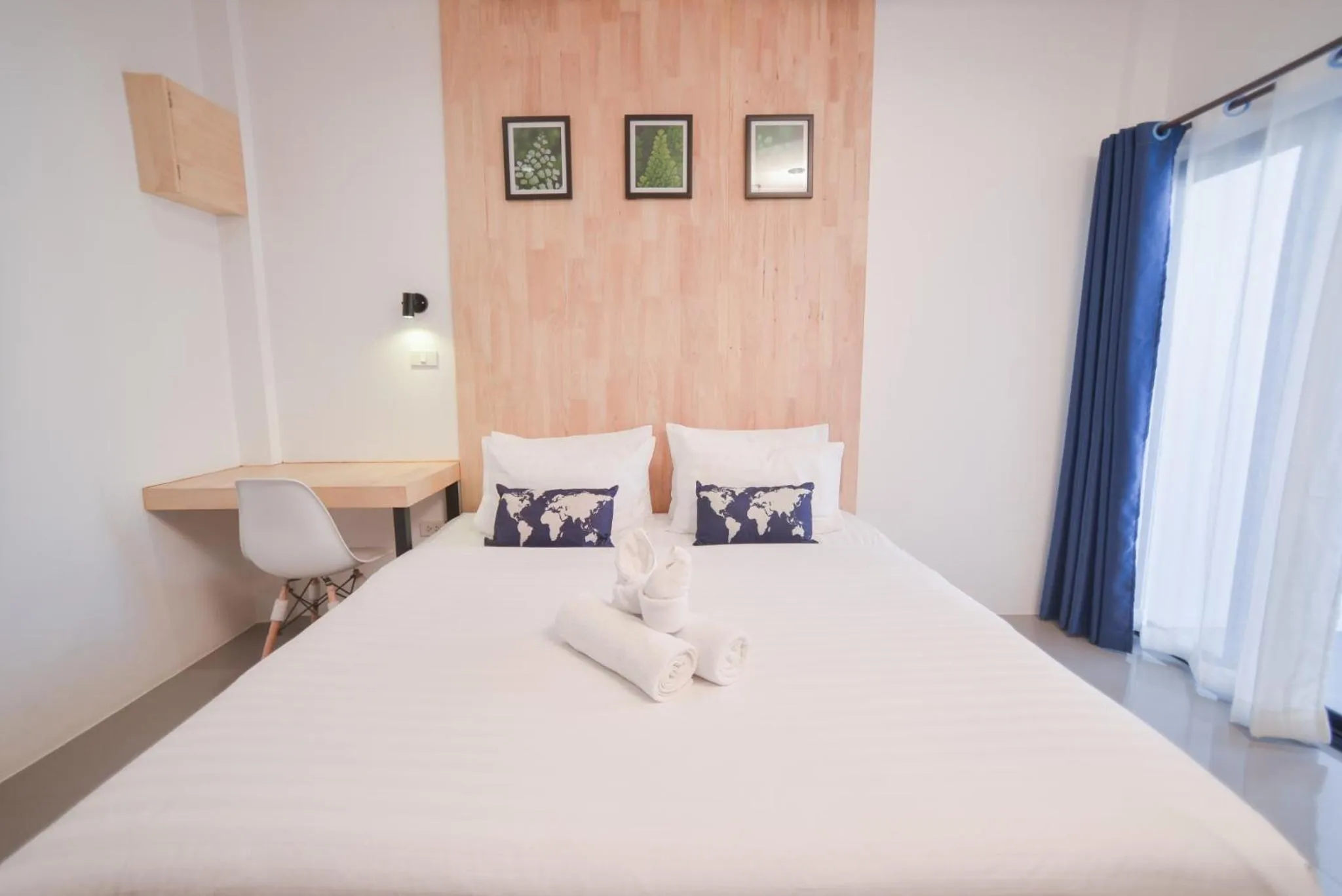 Bed in The Cozy Hotel