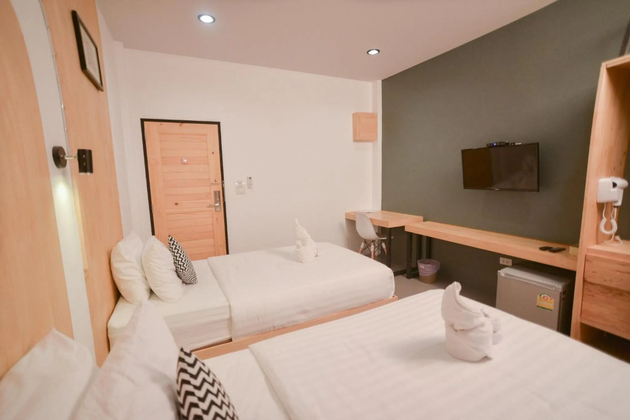 Bed in The Cozy Hotel