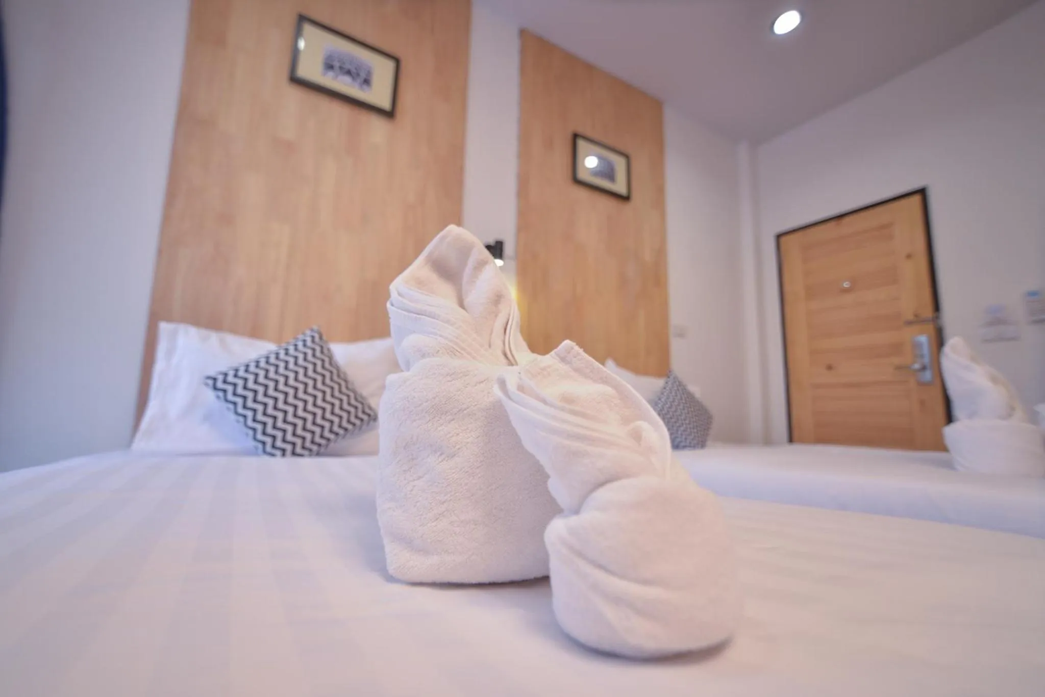 Bed in The Cozy Hotel