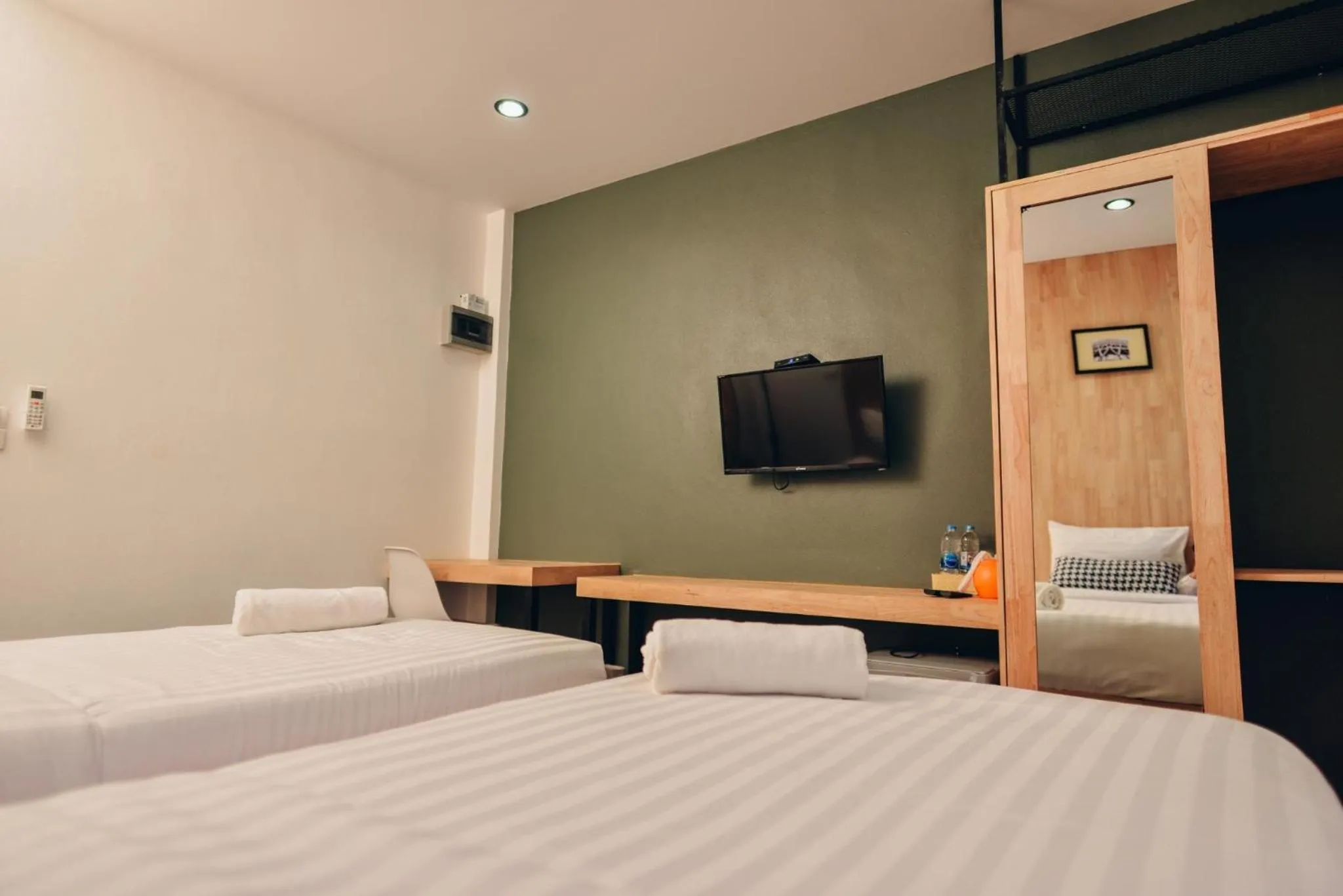 Bed in The Cozy Hotel