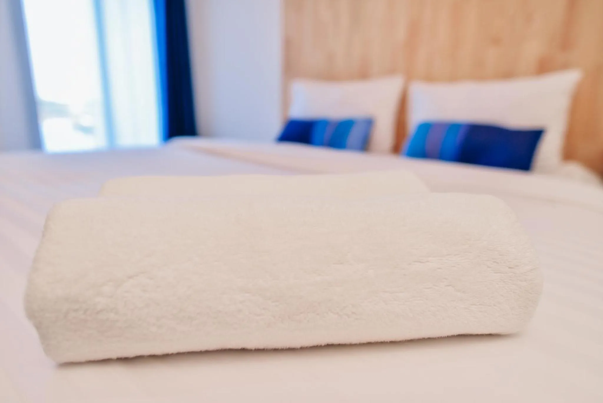 Bed in The Cozy Hotel