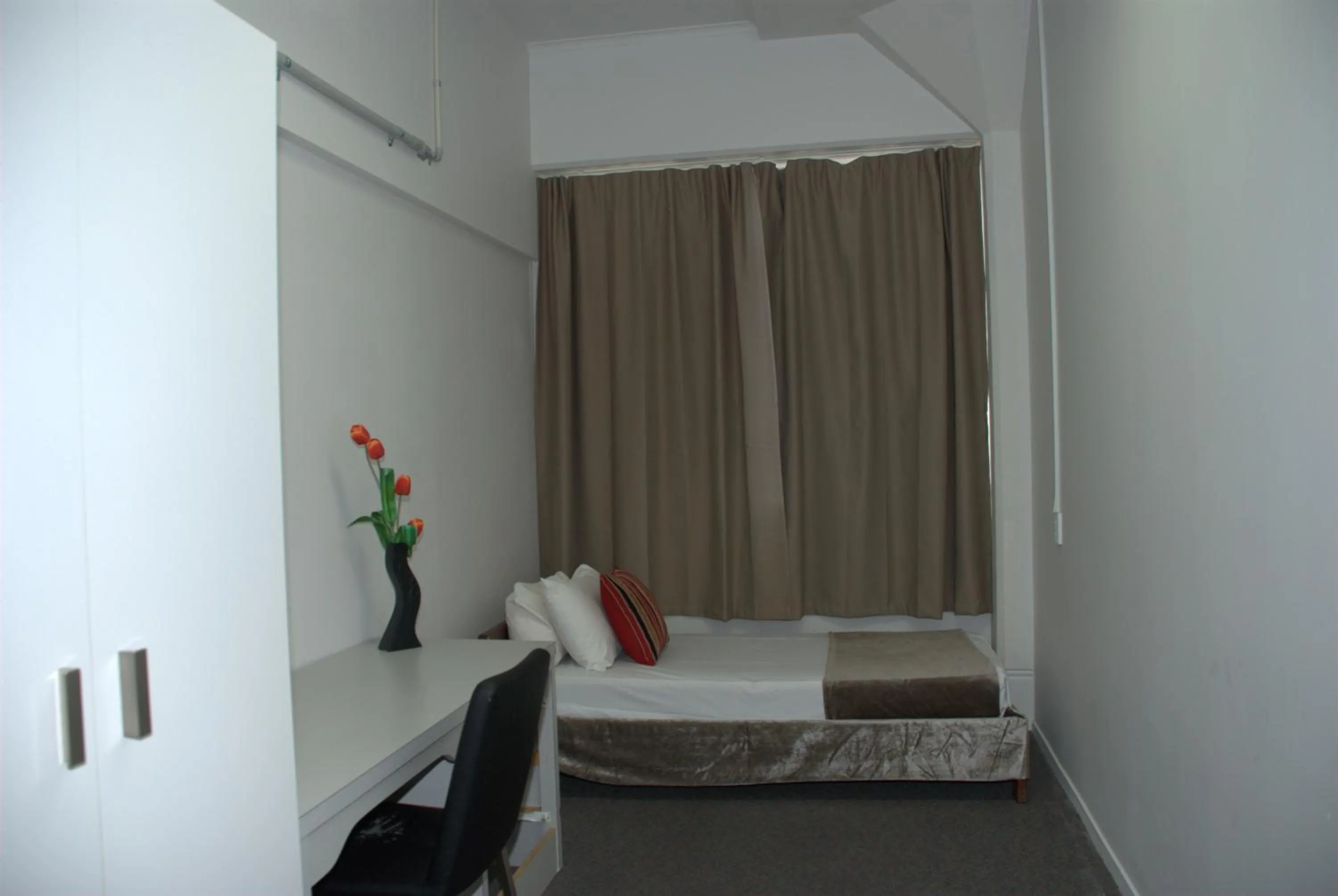 Bed in Hamilton City Inn