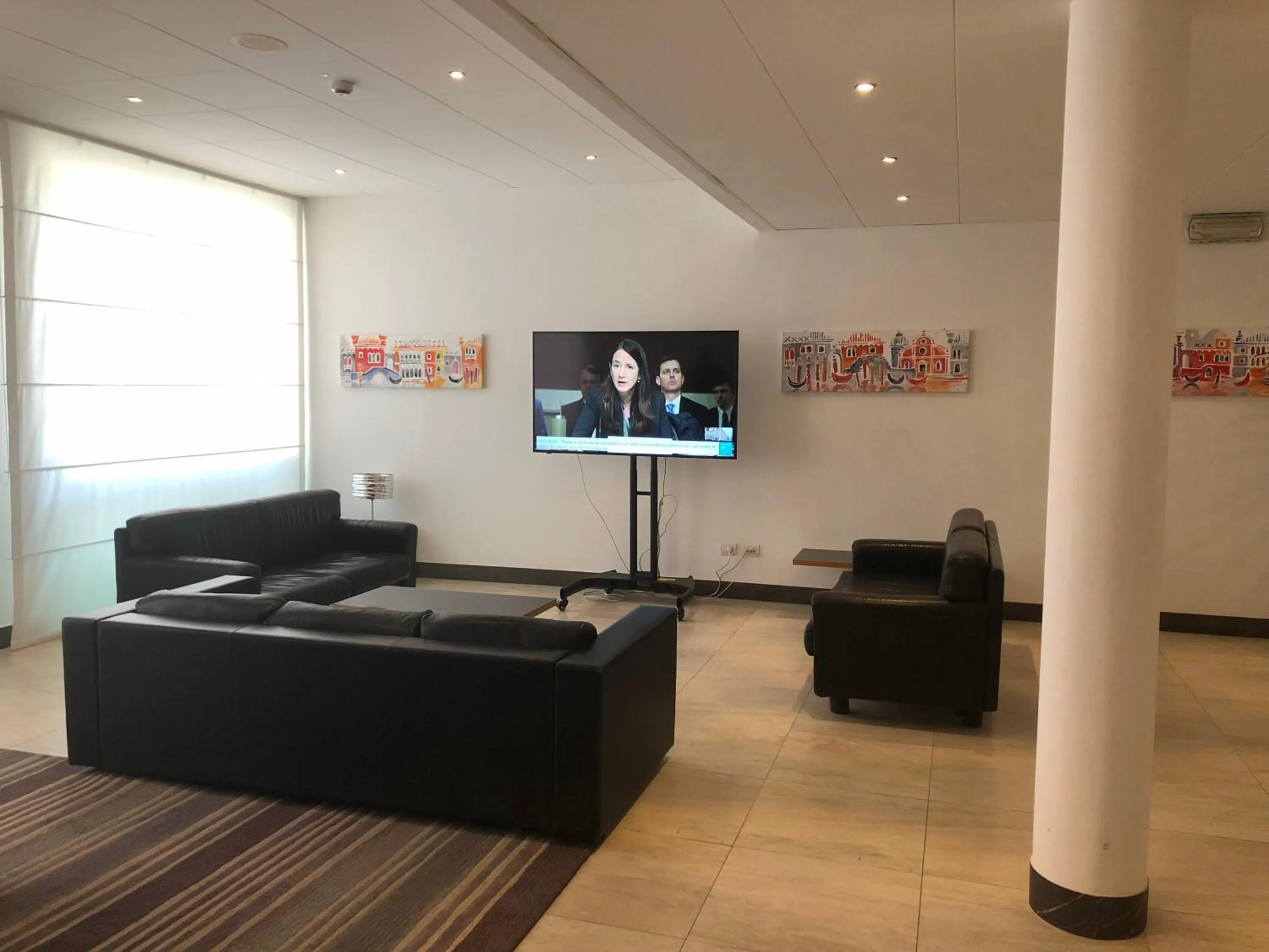 Communal lounge/ TV room in Hotel Lugano Torretta