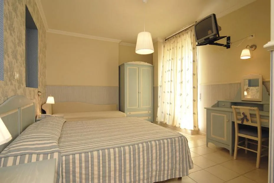 Bed in Hotel Mocambo piscina, spiaggia e biciclette