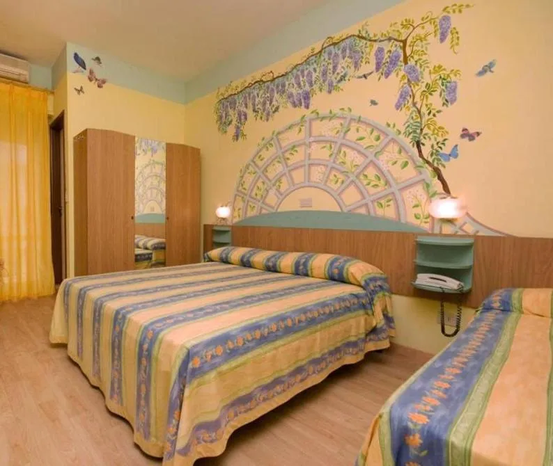 Bed in Hotel Mocambo piscina, spiaggia e biciclette