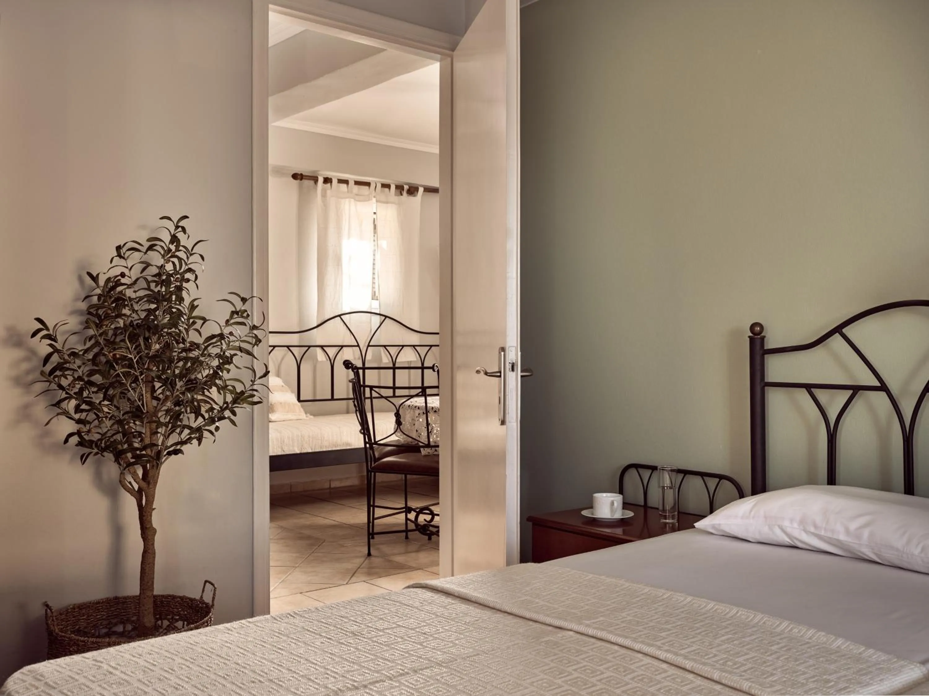 Bed in Razis Apartments