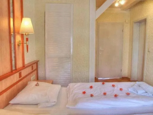 Bed in Vogel Hotel & Appartements