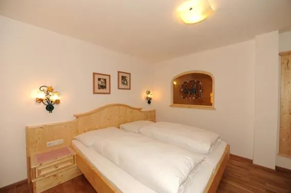 Bed in Hotel Wechselberger by Alpeffect Hotels