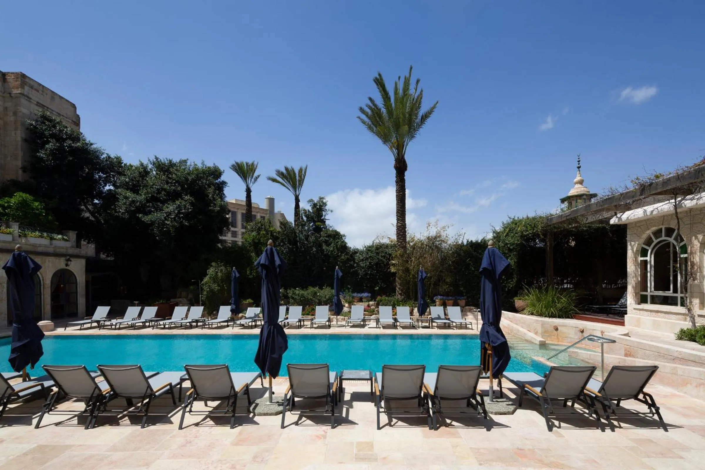 Swimming pool in The American Colony Hotel - Small Luxury Hotels of the World