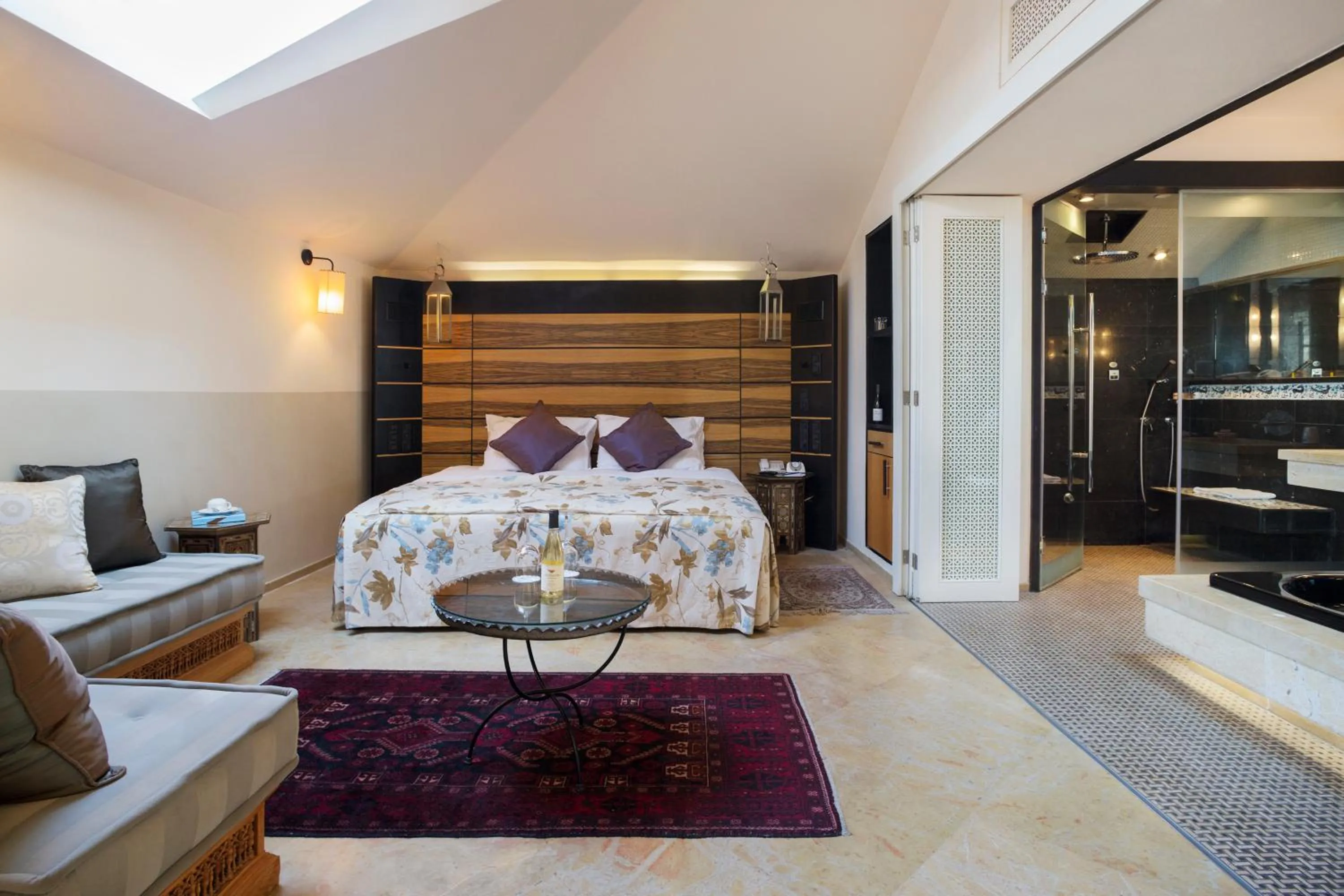 Seating area, Bed in The American Colony Hotel - Small Luxury Hotels of the World