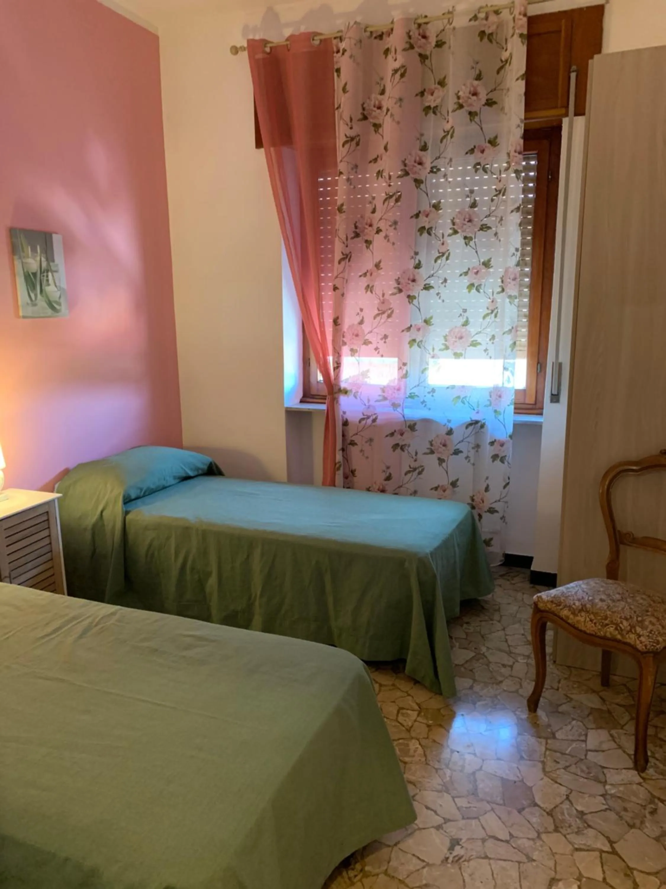 Bedroom in Affittacamere Serravalle Shopping