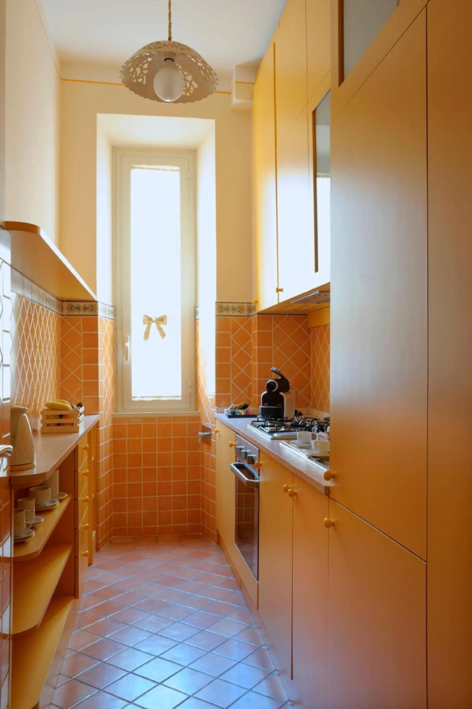 Kitchen or kitchenette in Dea Suite Roma