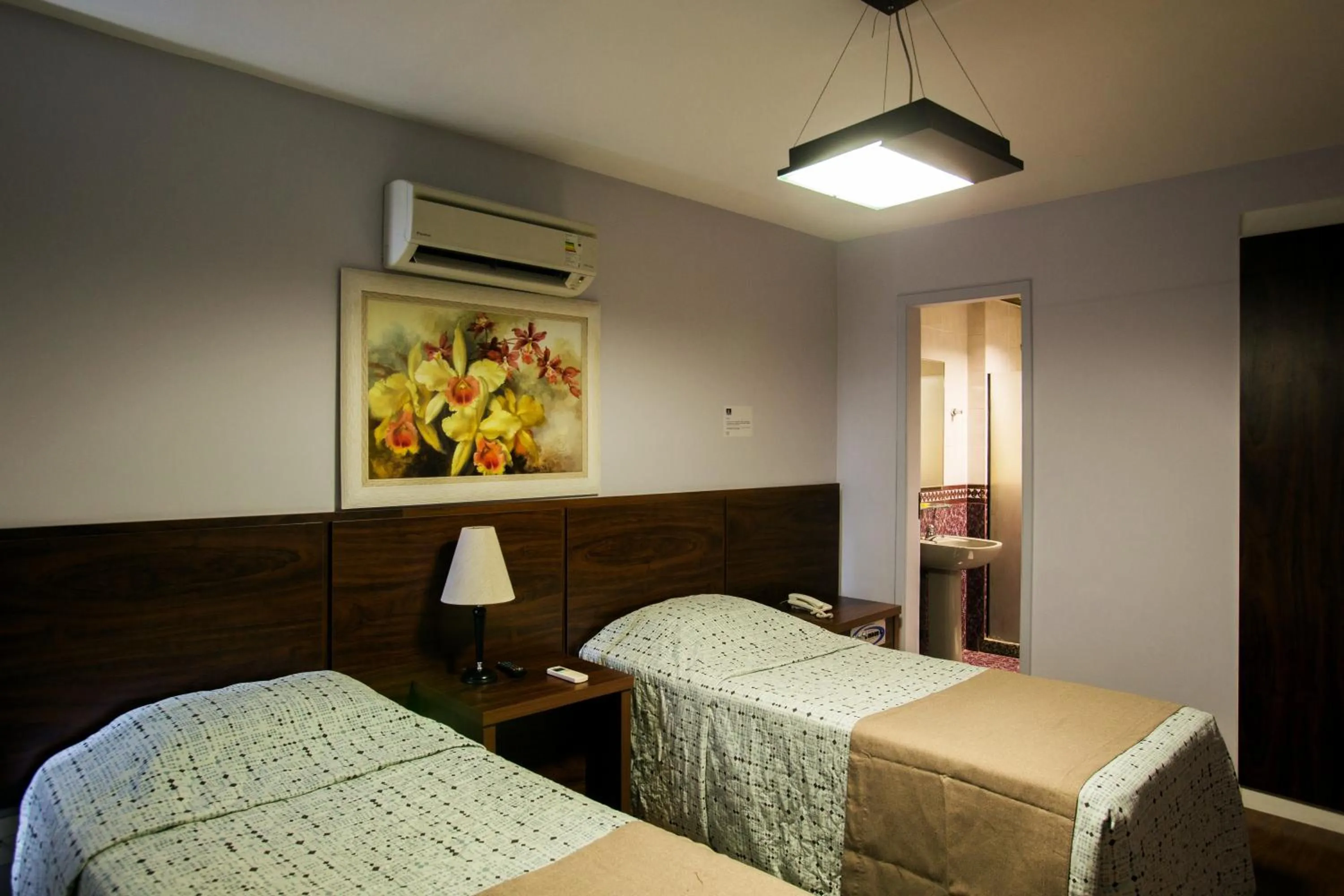 Bed in Gallant Hotel