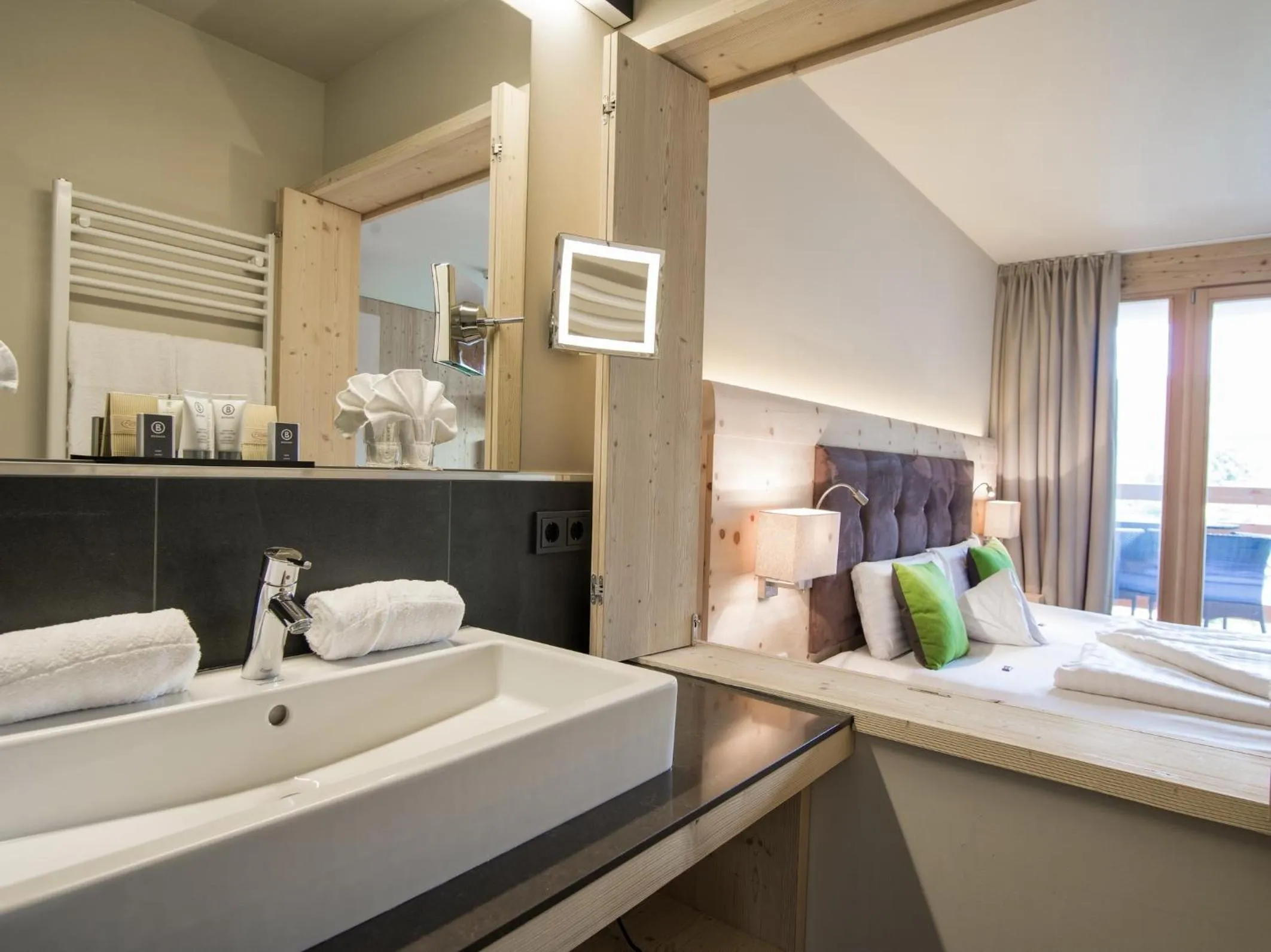 Bathroom, Bed in Alpin Juwel - Bio und Lifestylehotel