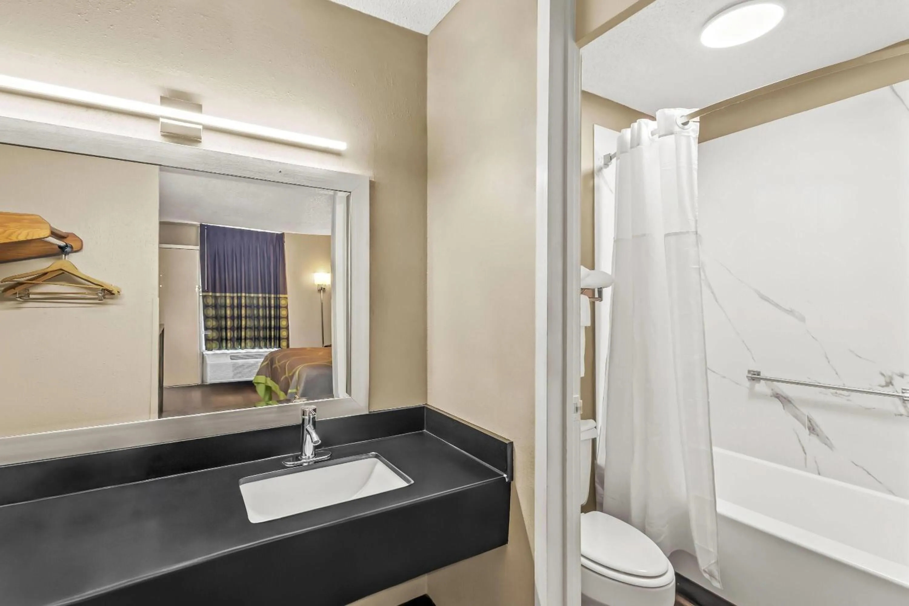 Bathroom in Super 8 by Wyndham Commerce