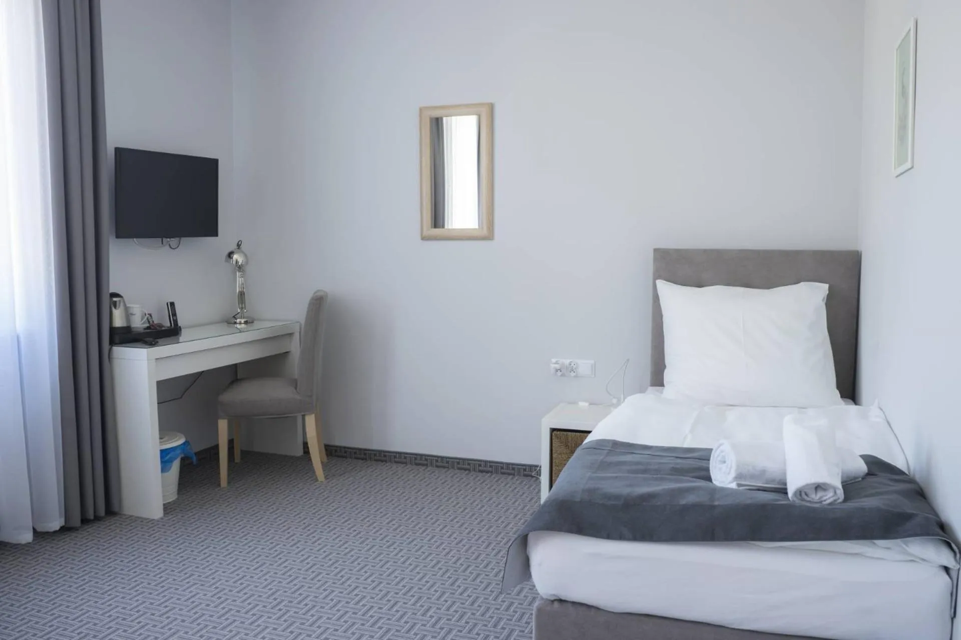 Photo of the whole room, Bed in Hotel Inner City