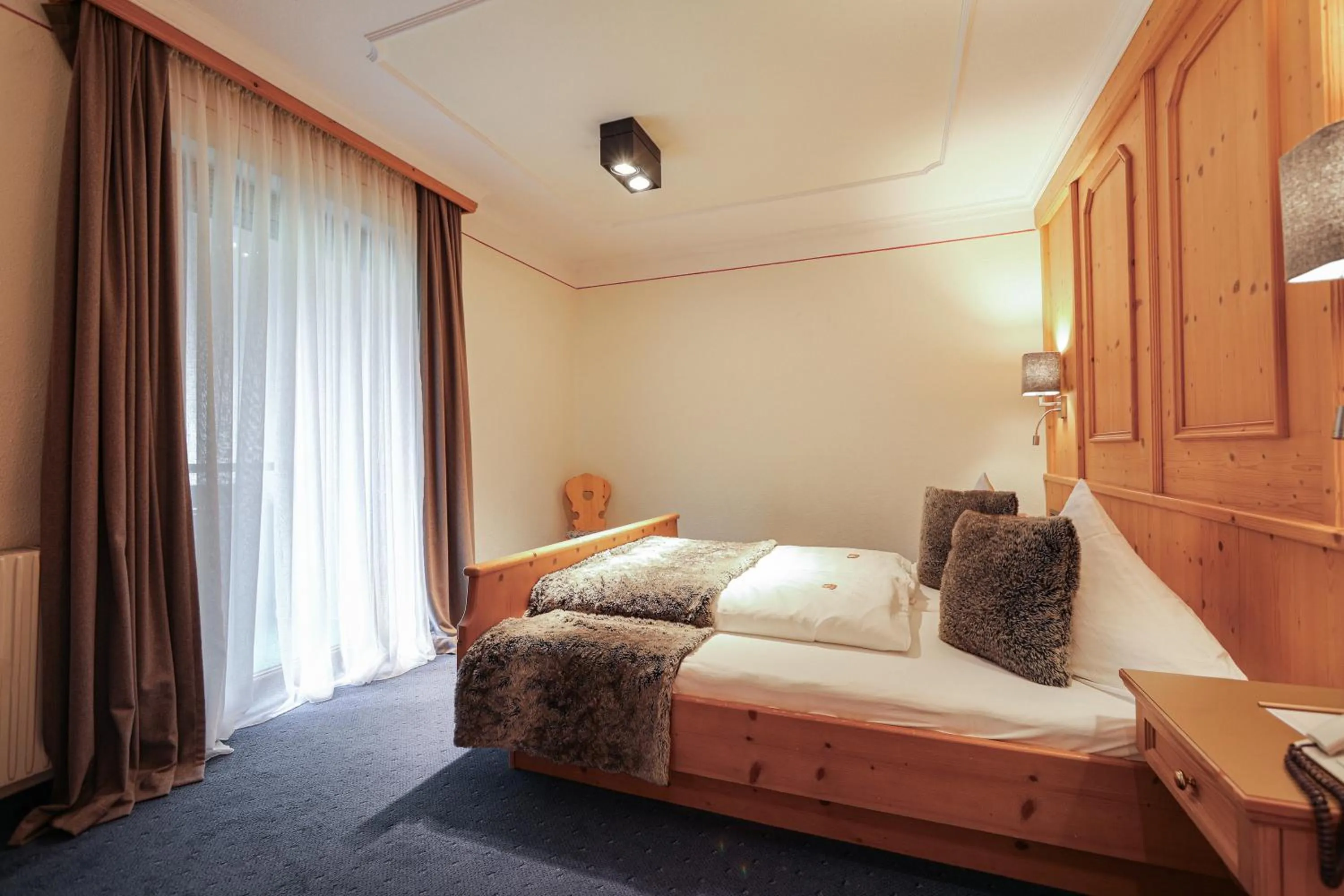 Bed in Chalet Madlein