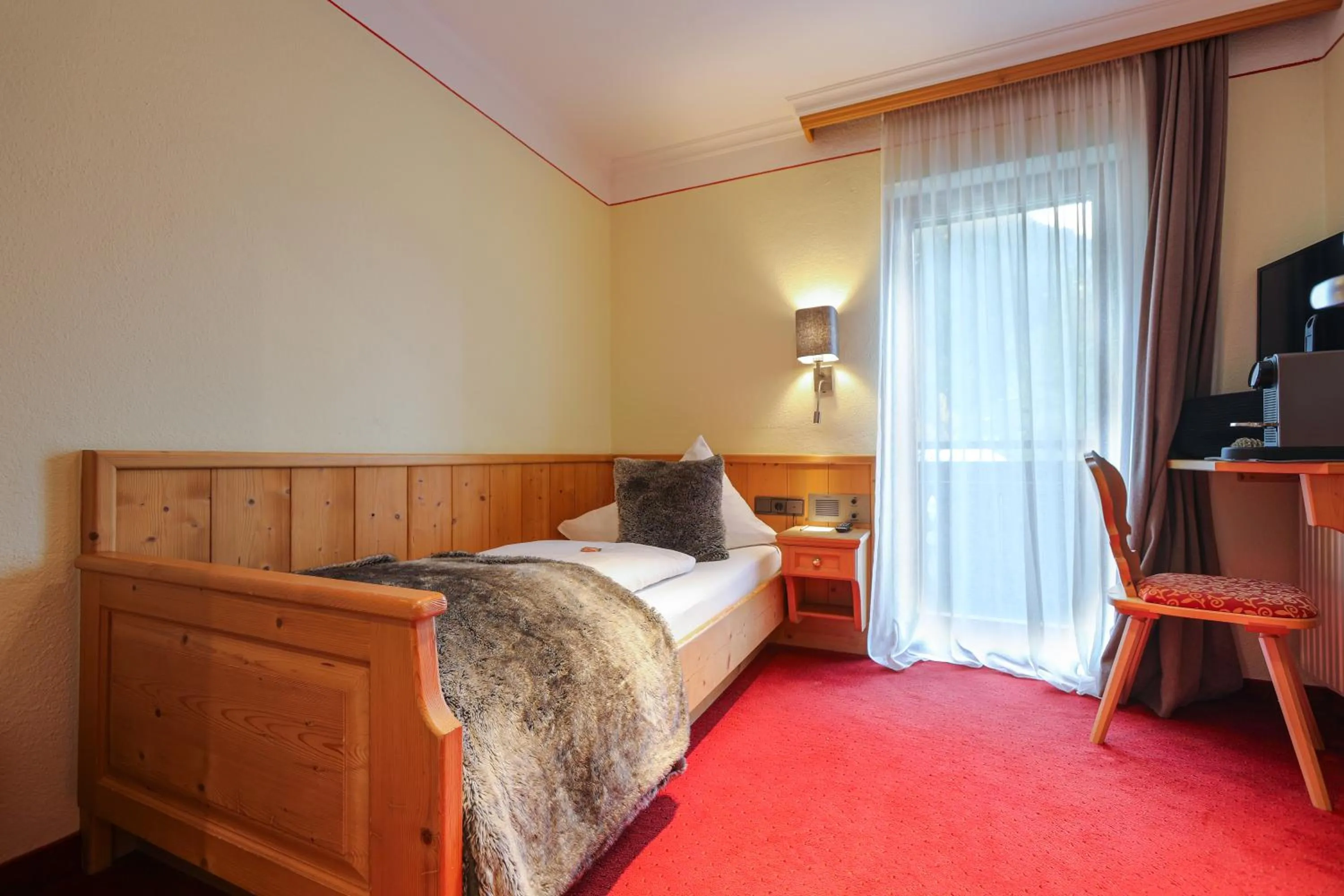 Bed in Chalet Madlein