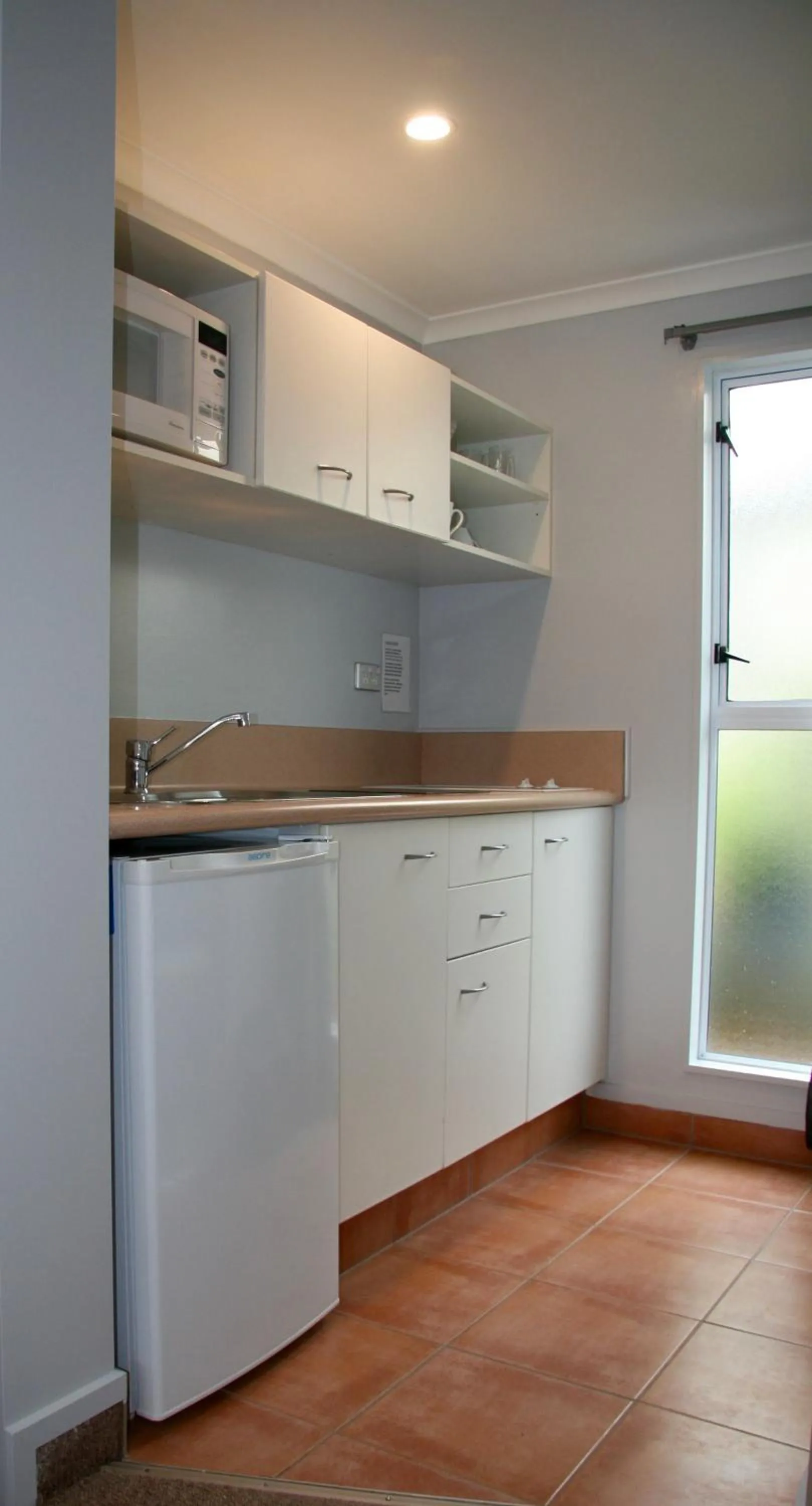 Kitchen or kitchenette in Lakeside Taupo Motel