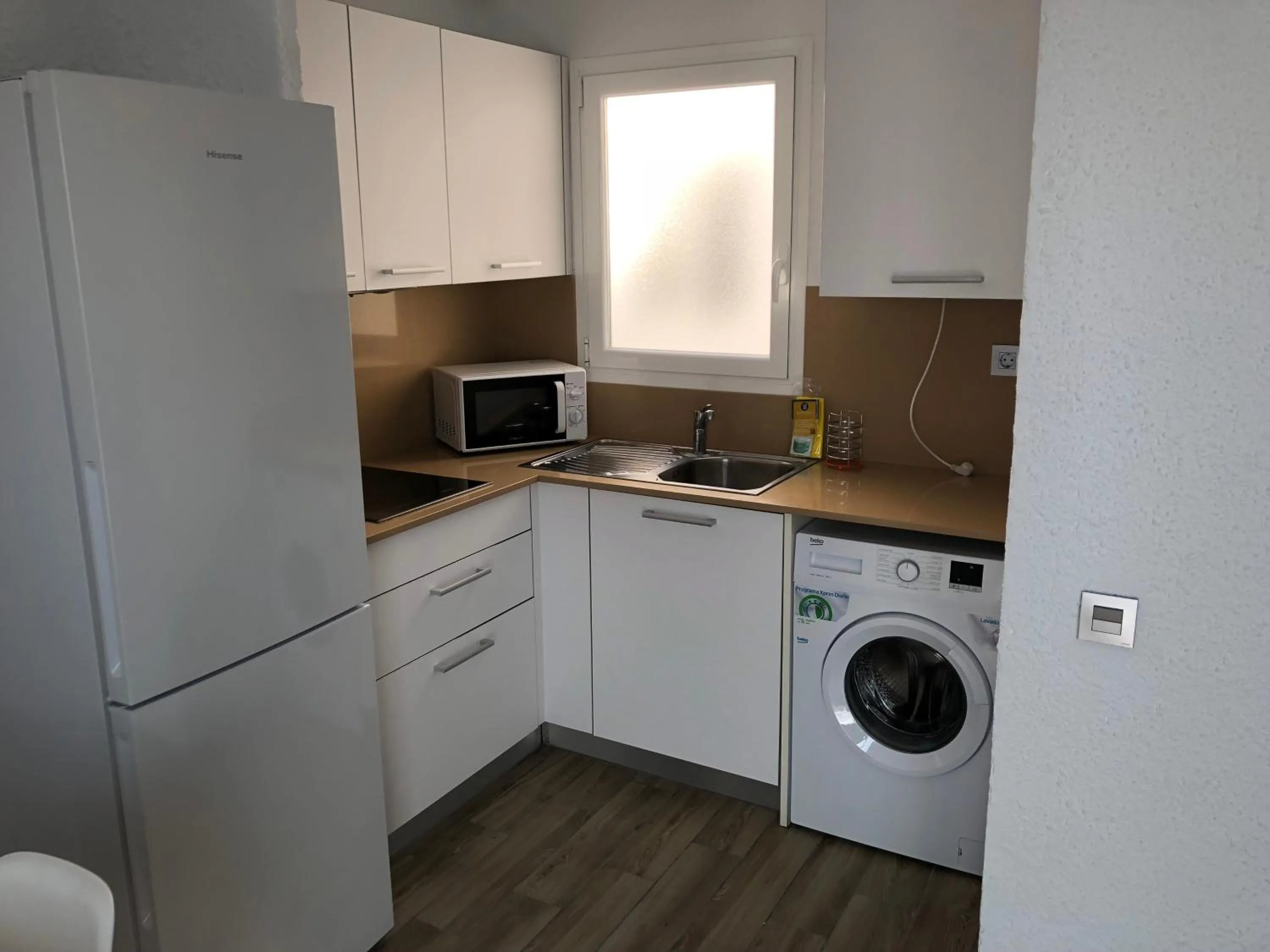 Communal kitchen in Apartamentos AR Muntanya Mar