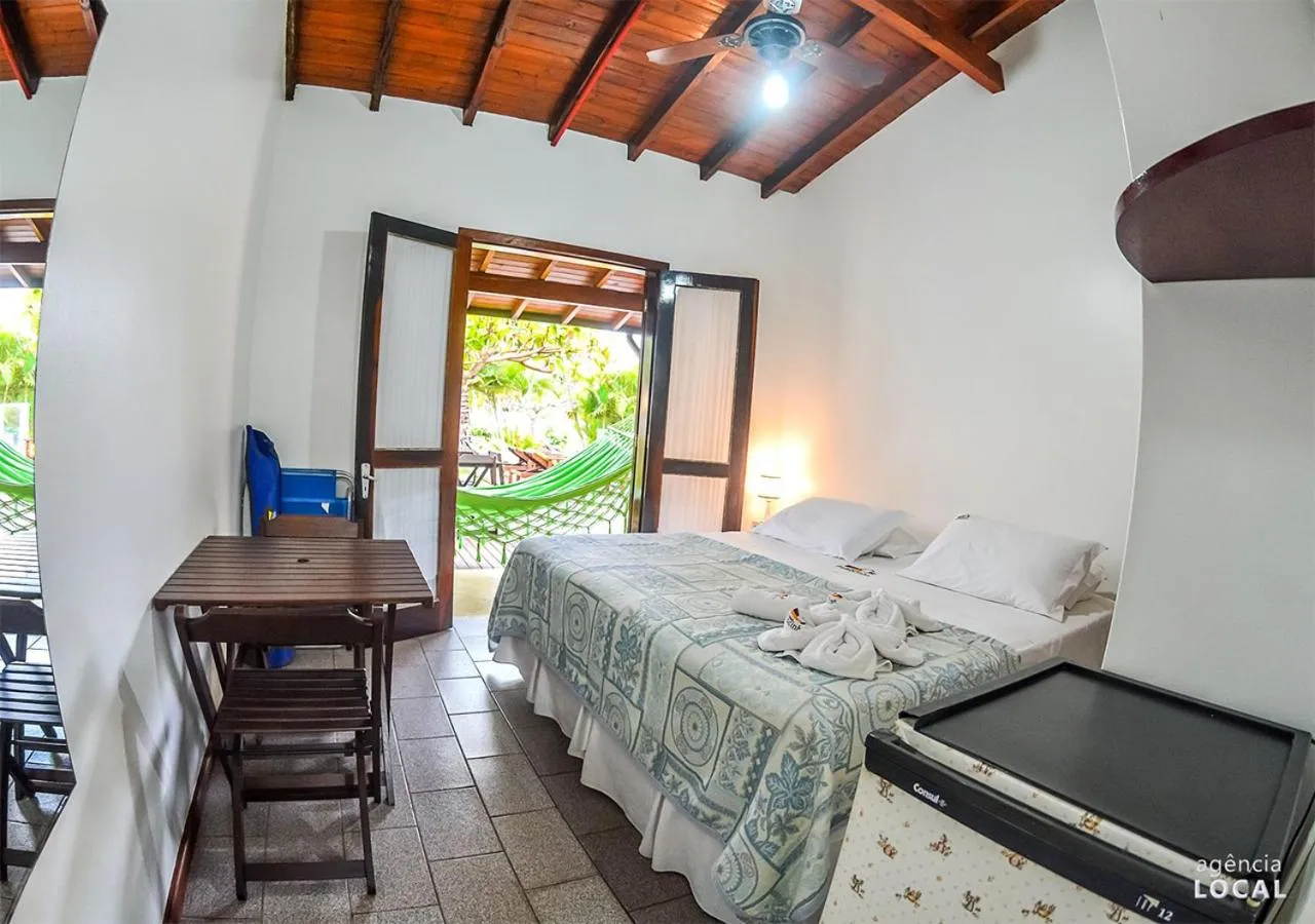 Photo of the whole room, Bed in Pousada Palhocinha Garopaba