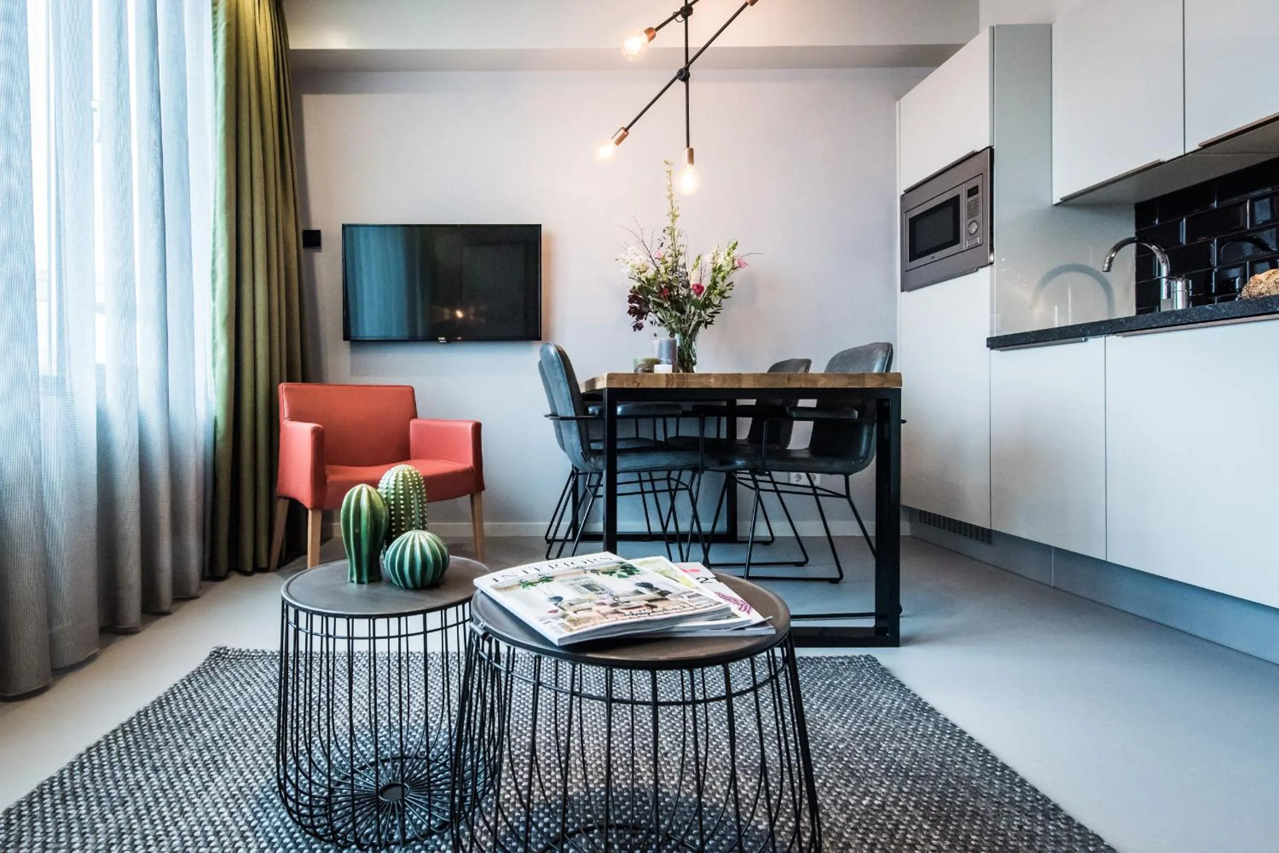 Dining area in YAYS Amsterdam East by Numa