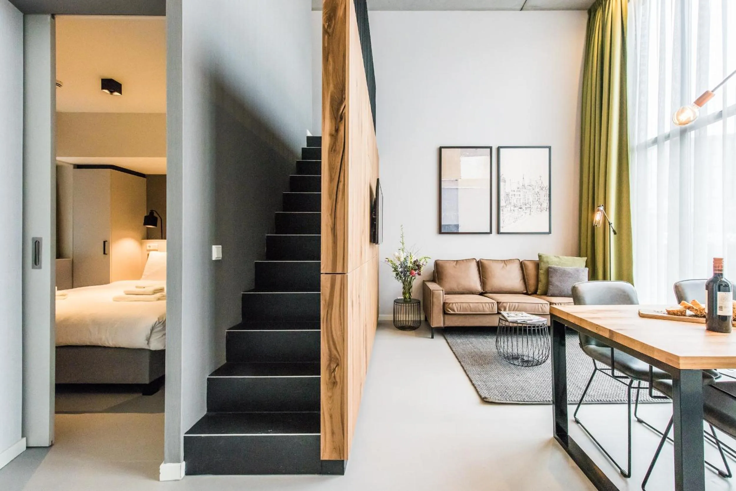 Living room, Bed in YAYS Amsterdam East by Numa