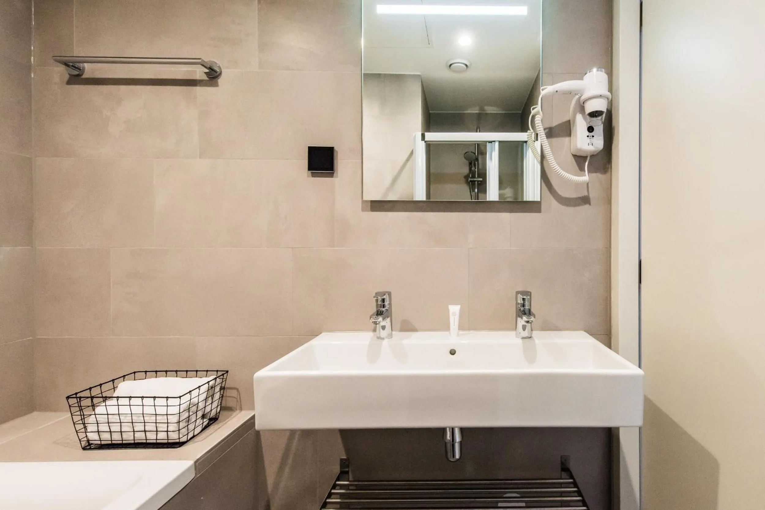 Bathroom in YAYS Amsterdam East by Numa