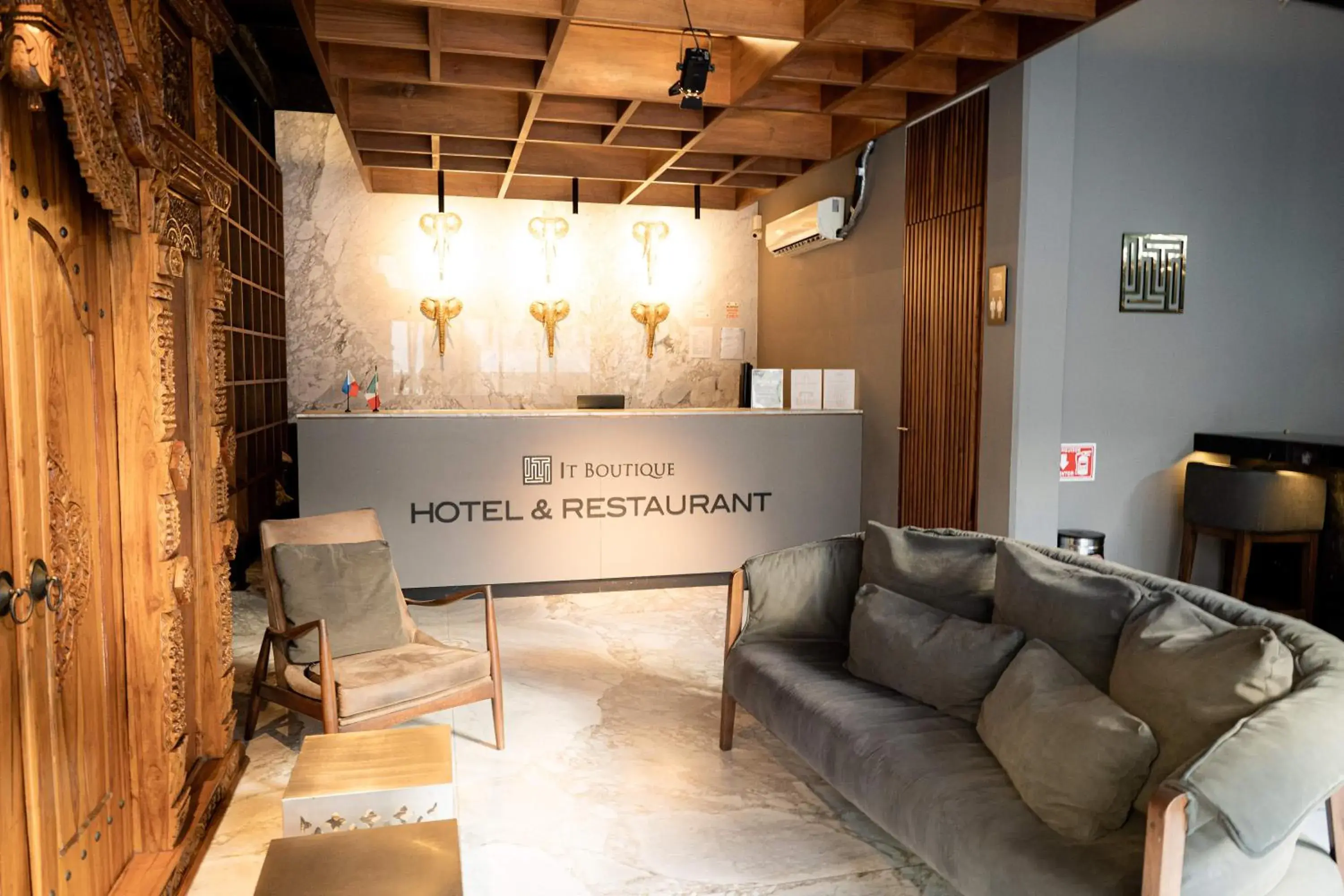 Lobby or reception in IT Boutique Hotel & Restaurant Lobby or reception in IT Boutique Hotel & Restaurant
