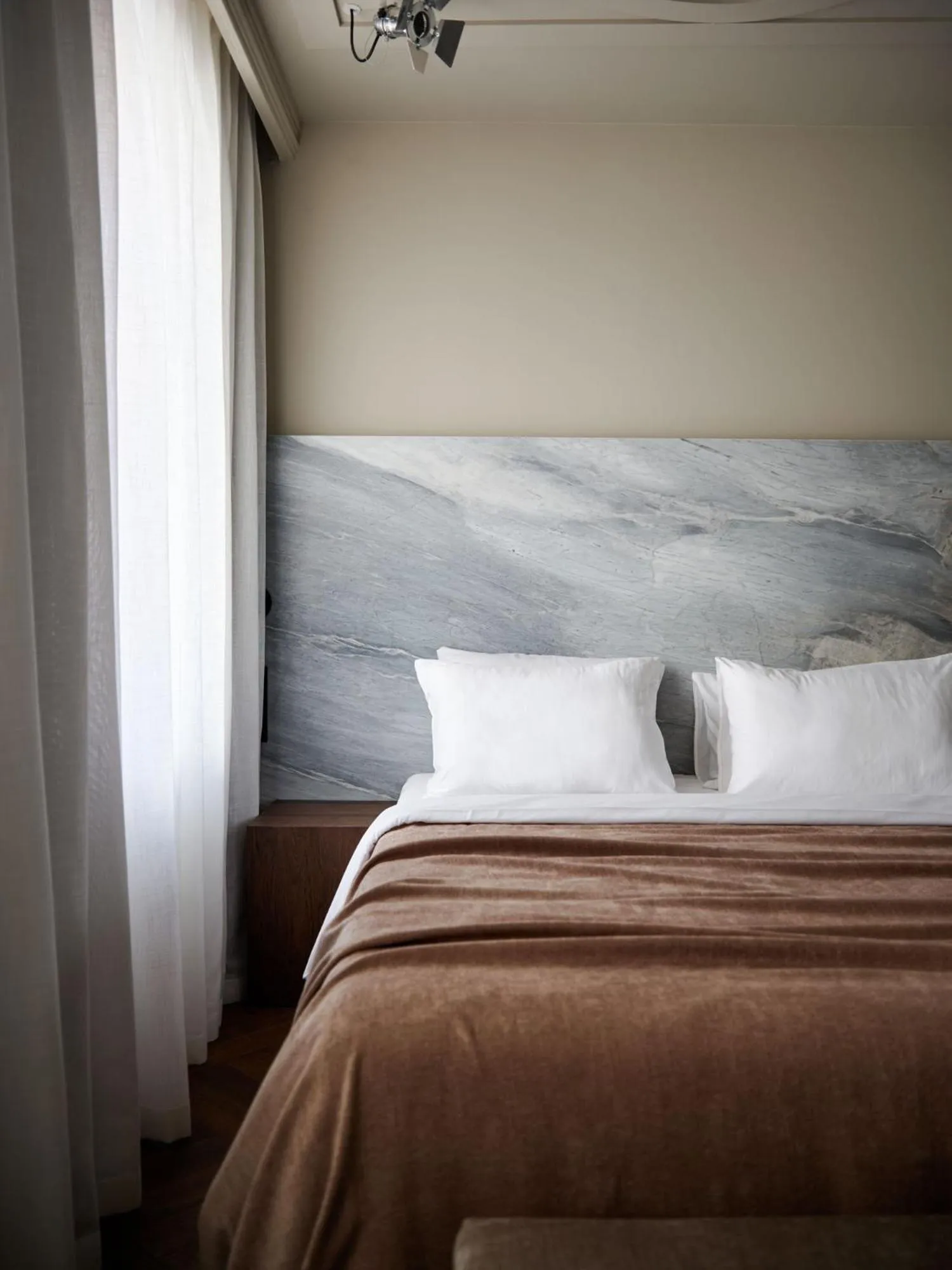 Bed in Hotel Reja, a Member of Design Hotels