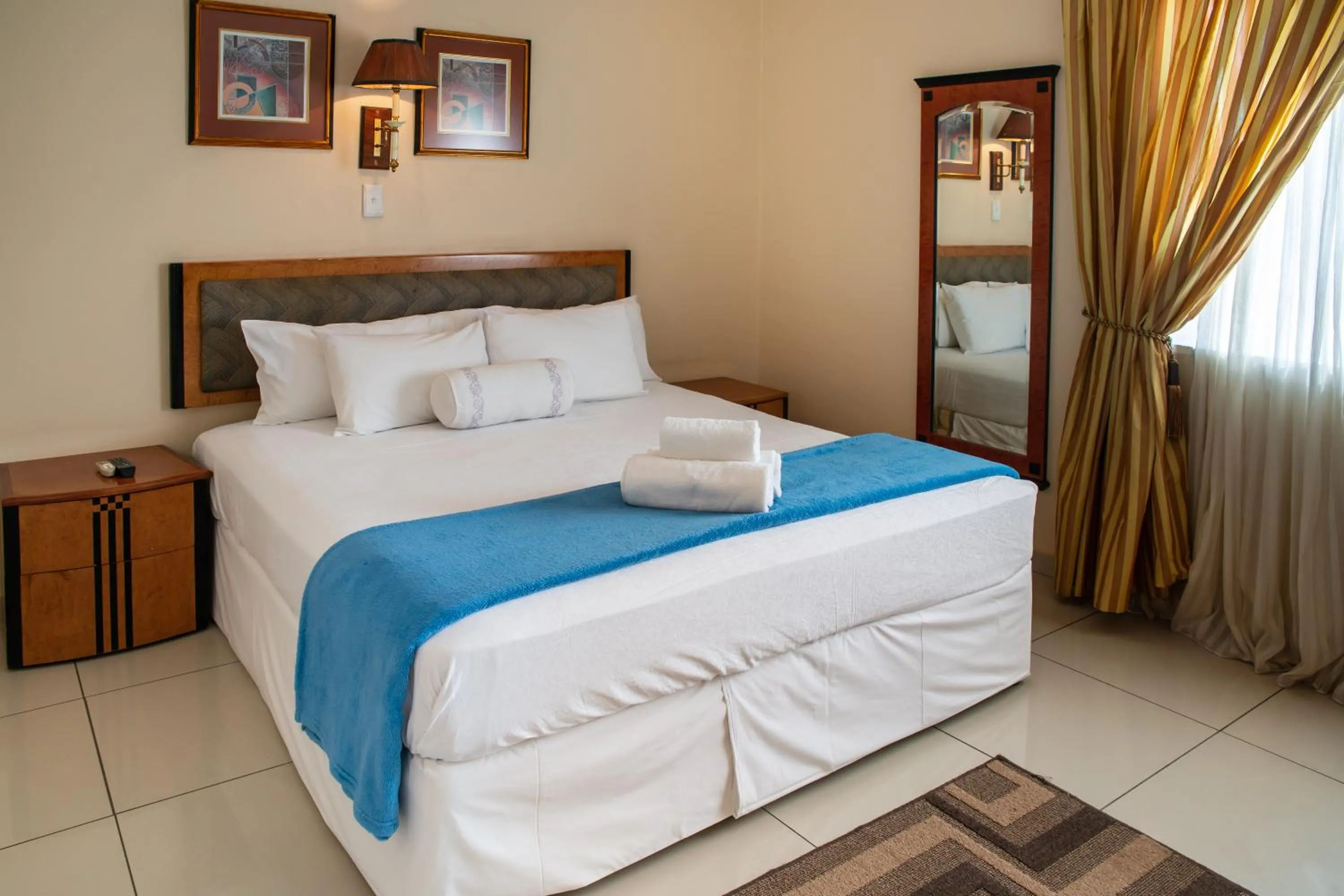 Photo of the whole room, Bed in Ngwenya Hotel & Conference Centre