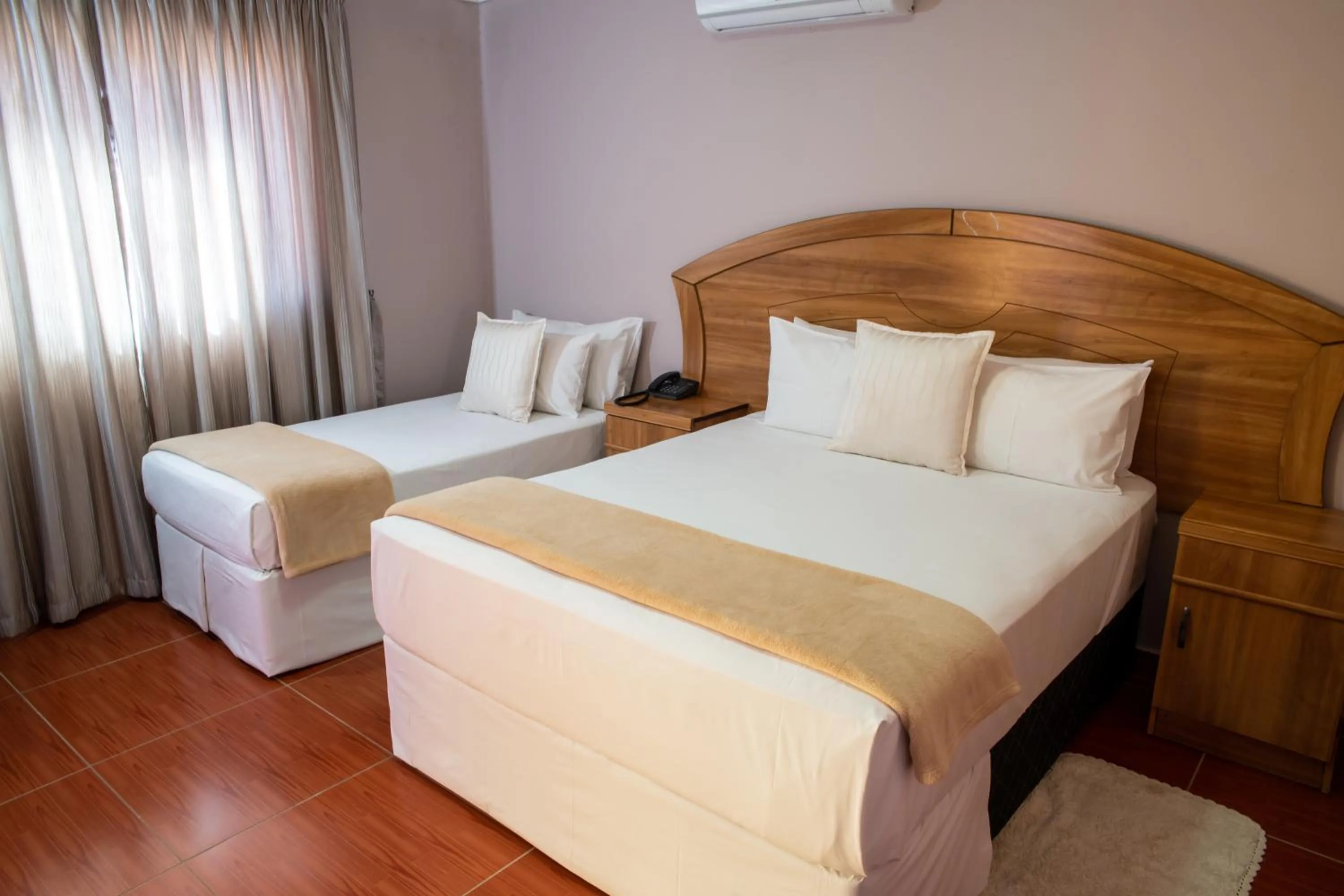 Bedroom, Bed in Ngwenya Hotel & Conference Centre