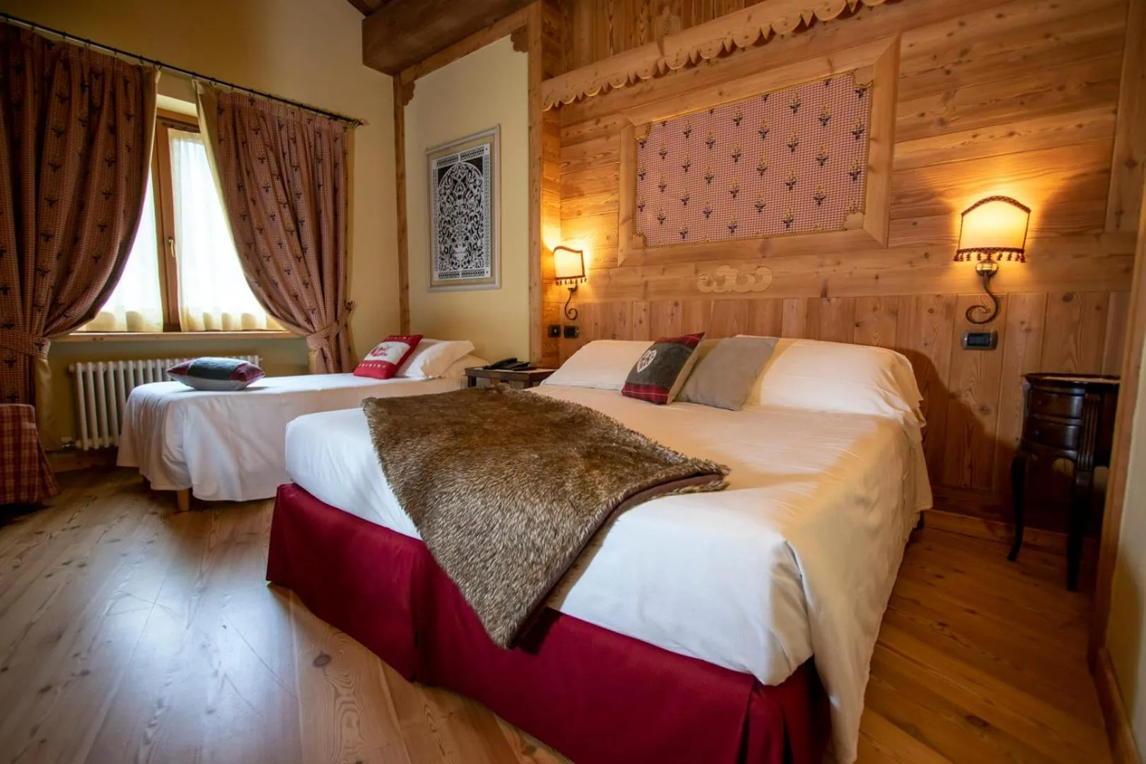 Bed in Laghetto Alpine Hotel & Restaurant