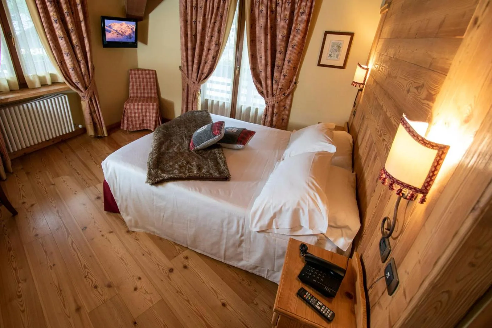 Bed in Laghetto Alpine Hotel & Restaurant