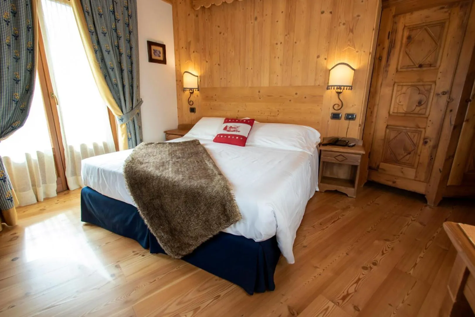 Bed in Laghetto Alpine Hotel & Restaurant